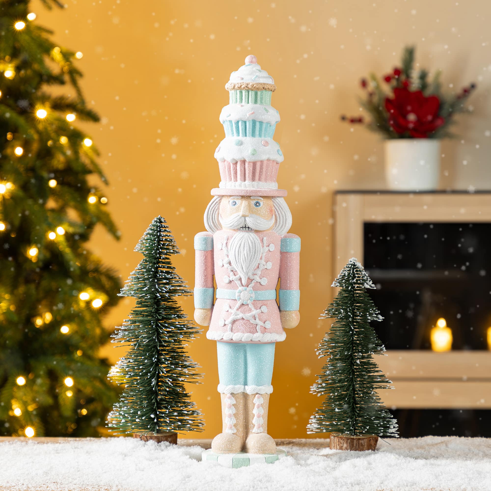 Glitzhome&#xAE; 18.25&#x22; Resin Christmas Cupcake Nutcracker Table Decor