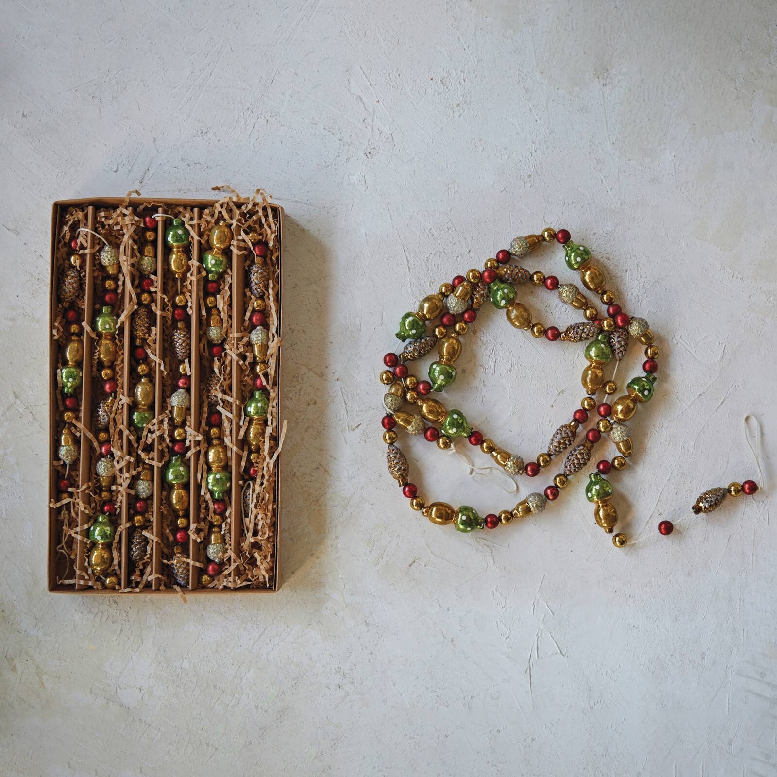 Hello Honey&#xAE; 6ft. Multicolor Glass Pinecones, Acorns &#x26; Mushrooms Garland in Box