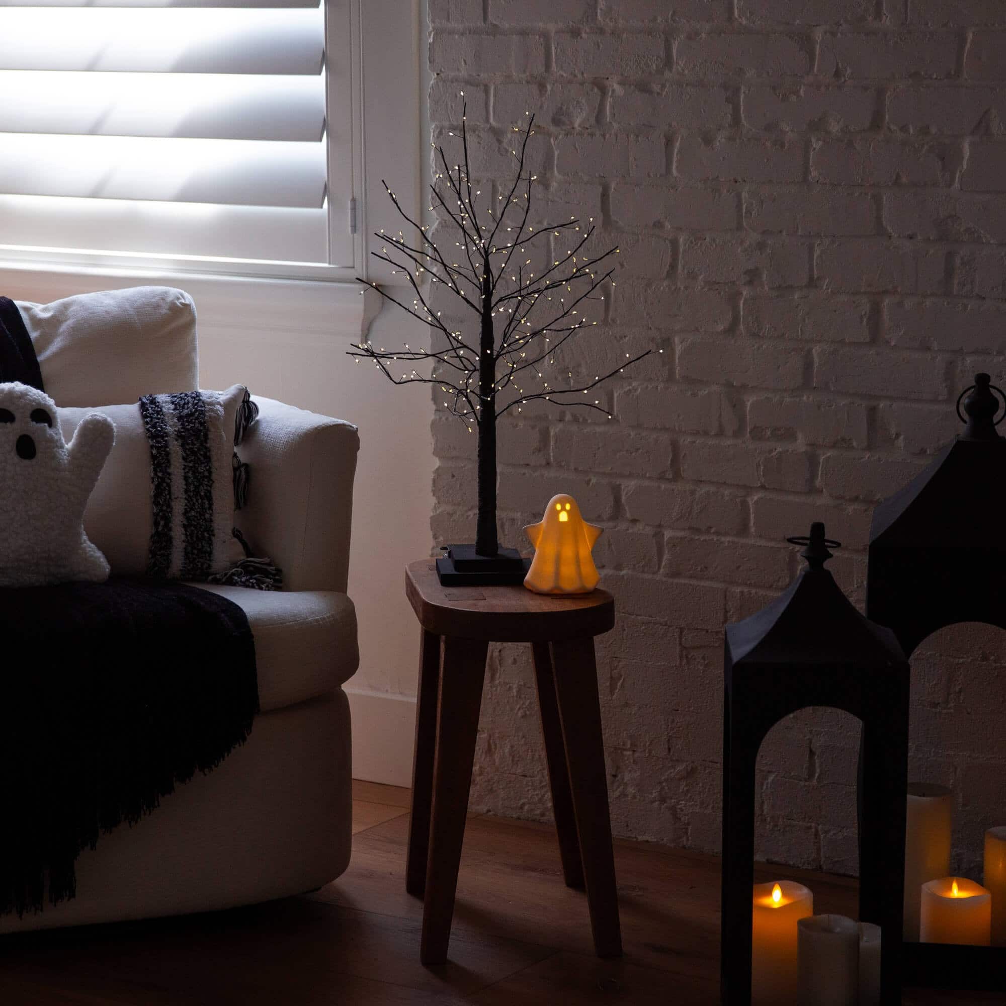 2ft. Pre-Lit Artificial Halloween Black Twig Tree with 210 Warm White Fairy Copper Wire LED Lights