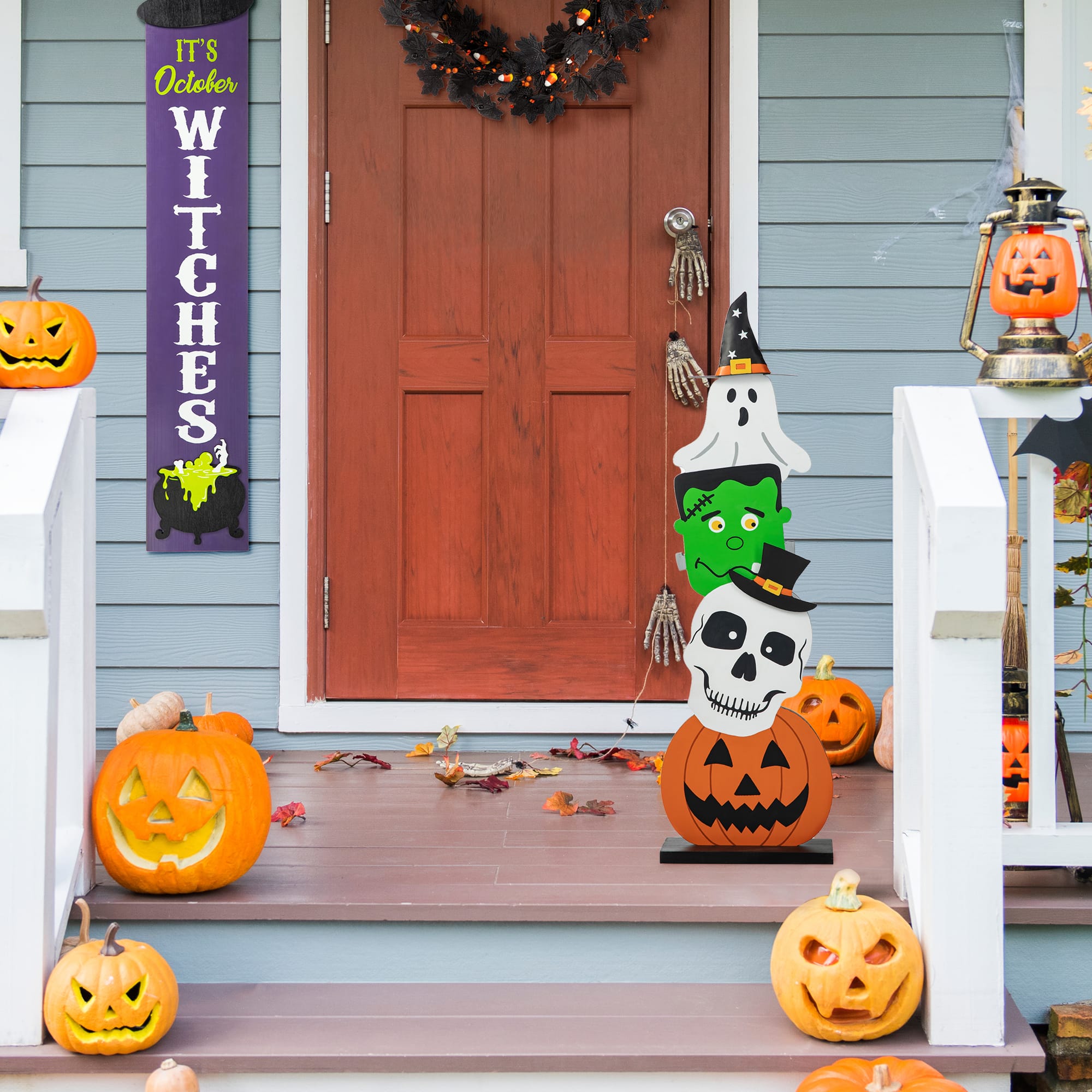 Glitzhome&#xAE; 36&#x22; Halloween Wood Stacked Ghost, Frankenstein, Skull &#x26; Pumpkin Porch D&#xE9;cor