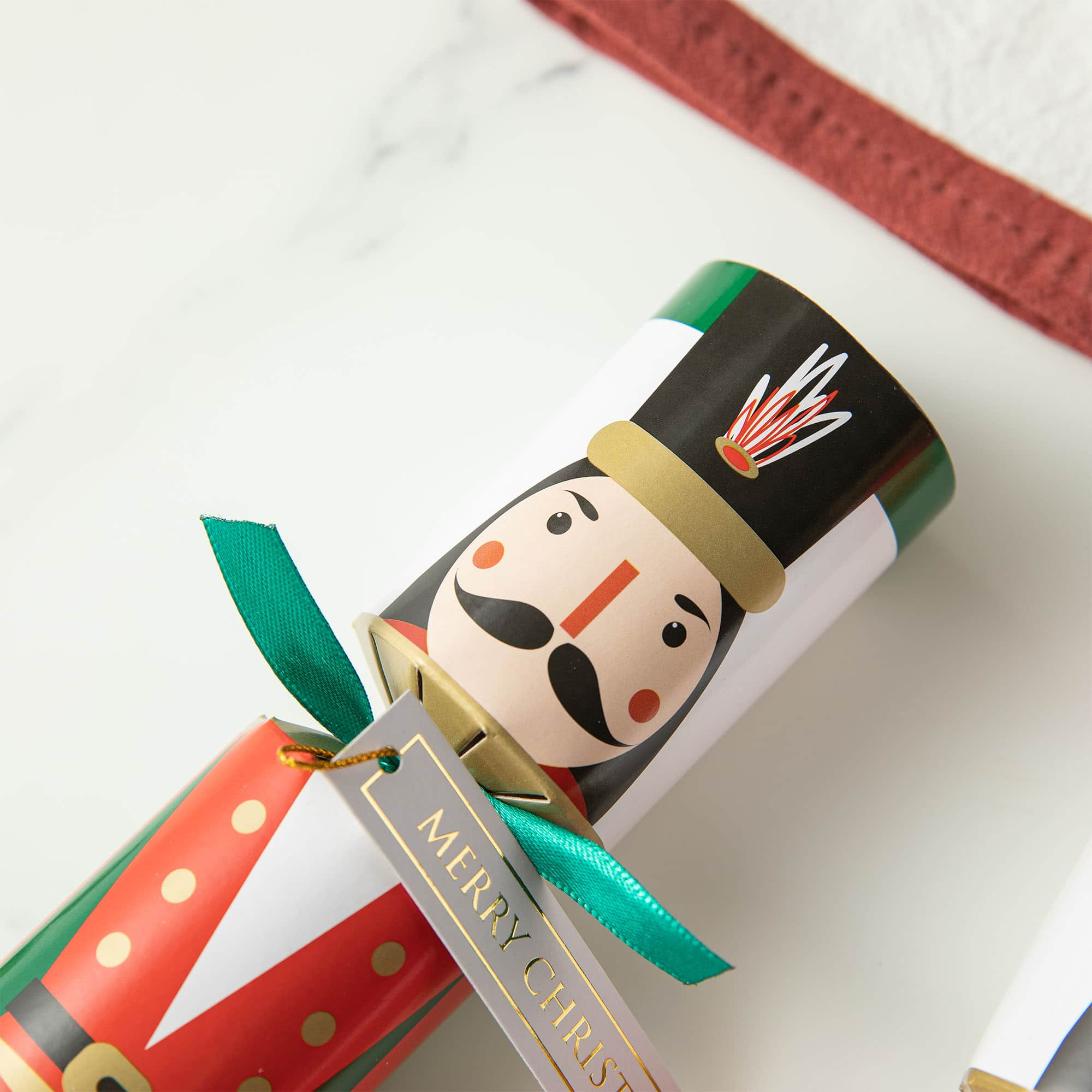 Glitzhome&#xAE; 10&#x22; Christmas Nutcracker Party Cracker with Gift Contents, 8ct.