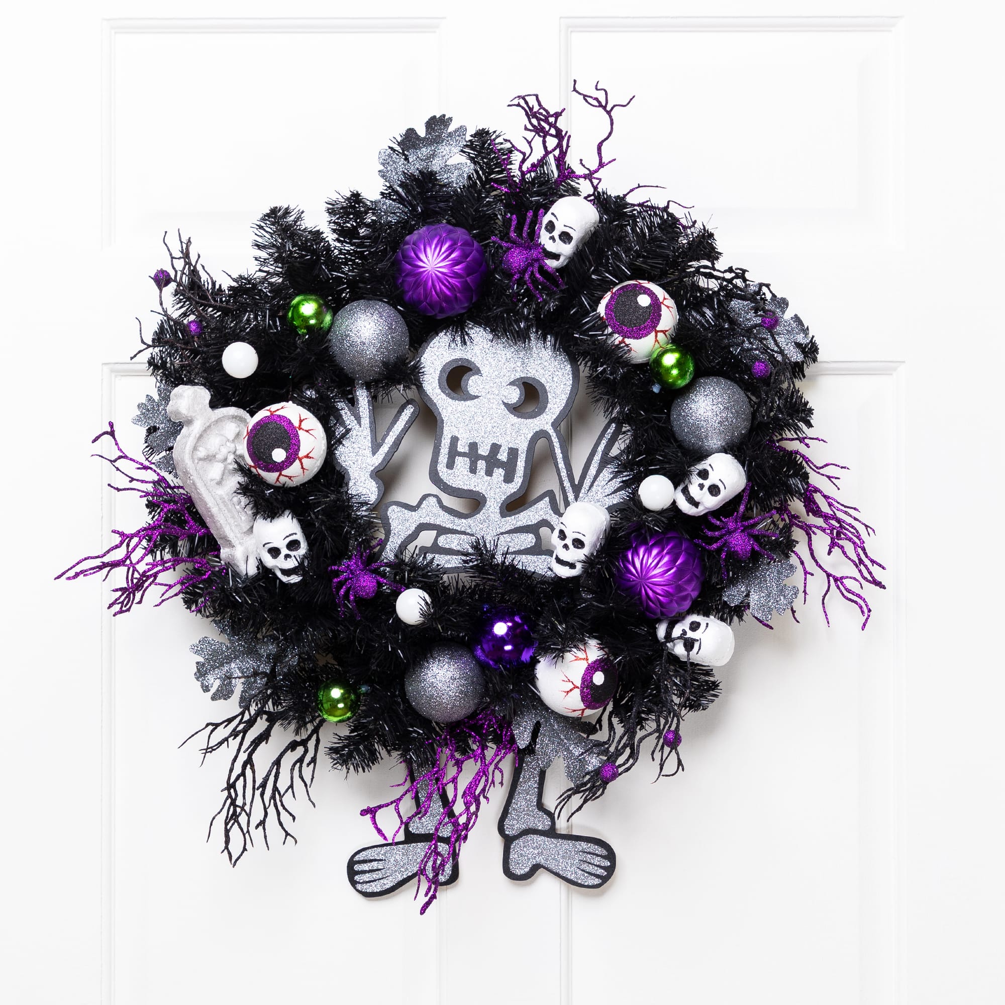 24'' Unlit Purple and Black Spooky Skeleton Pine Halloween Wreath