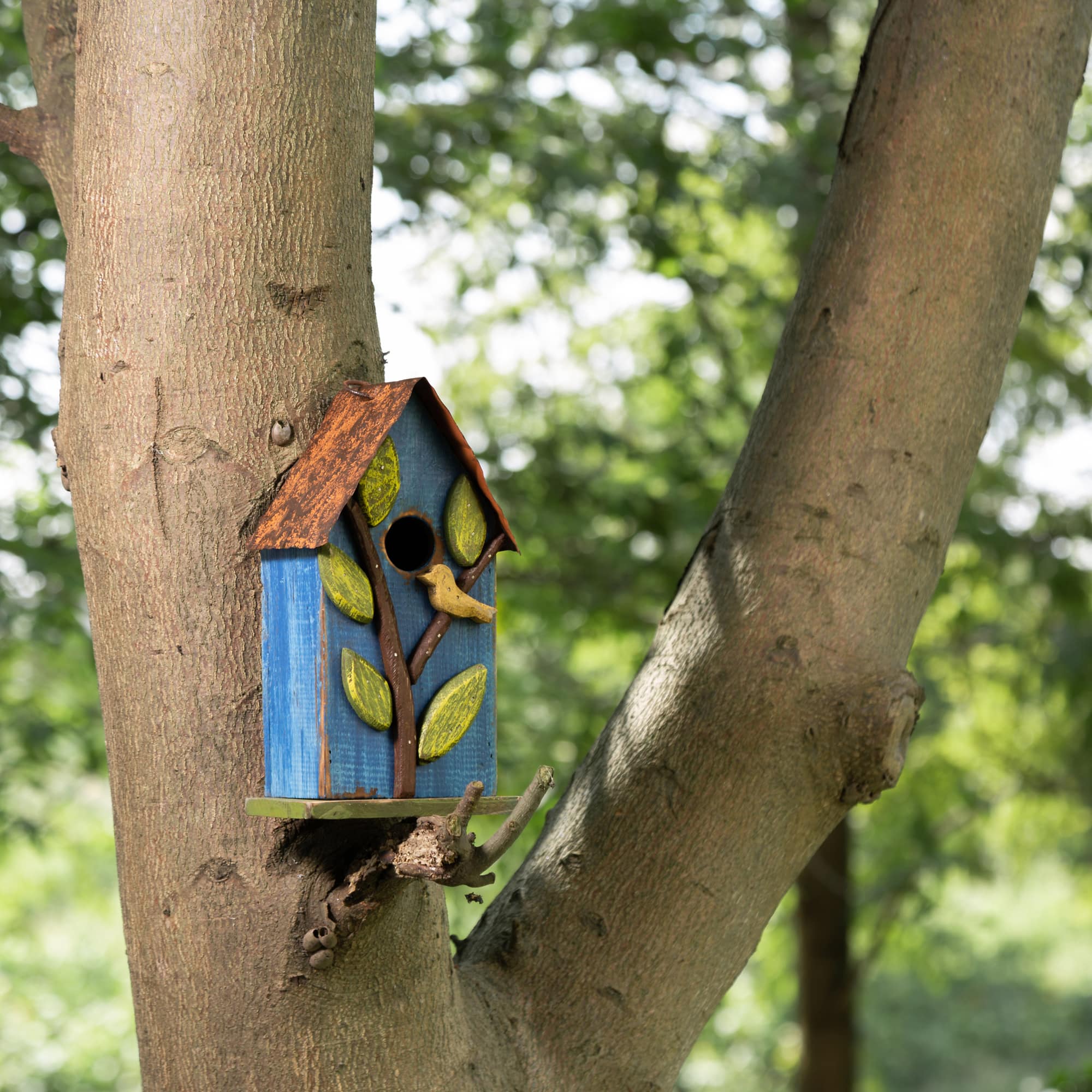 Glitzhome&#xAE; Distressed Wooden Birdhouse with Leaves