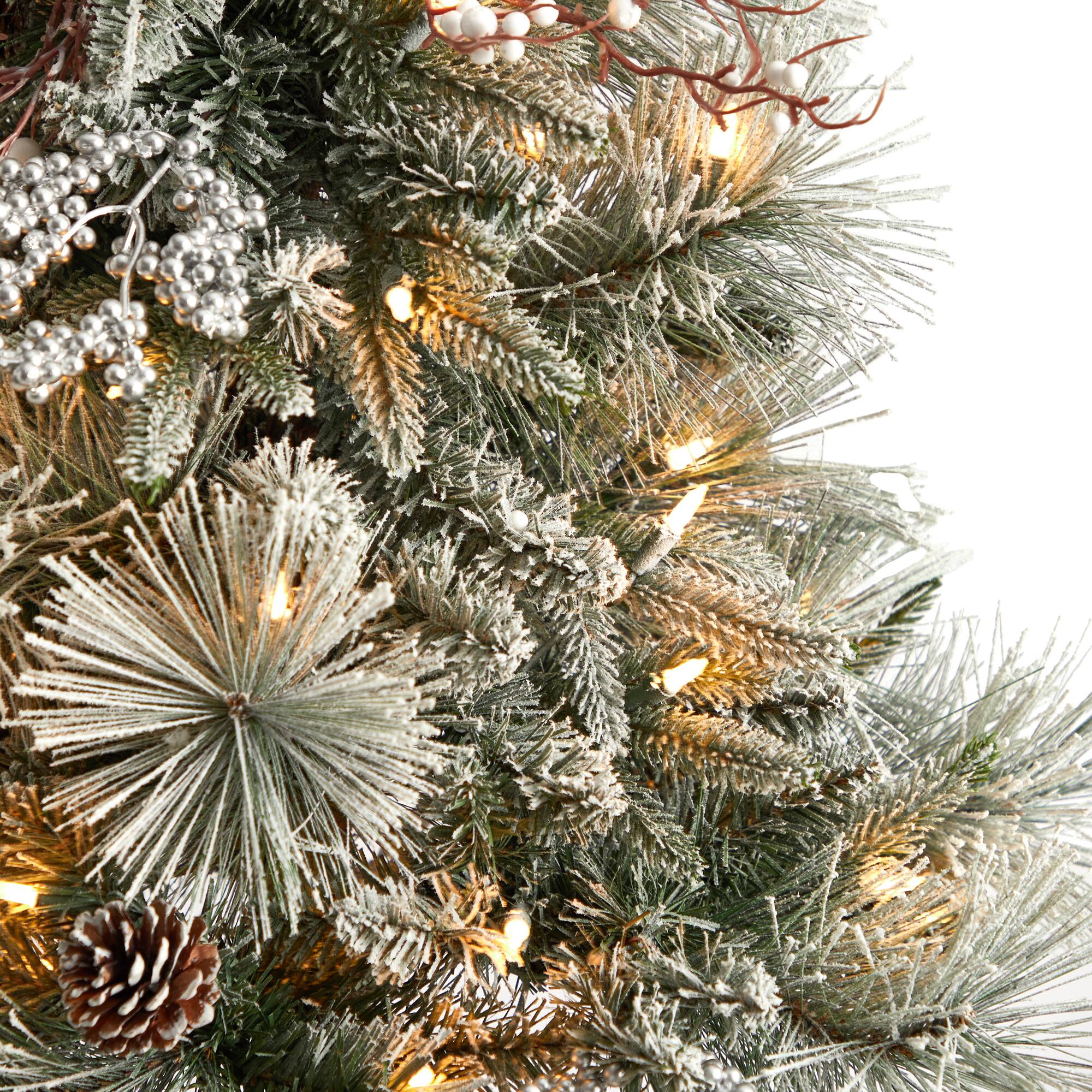 5ft. Pre-Lit Flocked Artificial Christmas Tree in Decorative Urn, White LED Lights