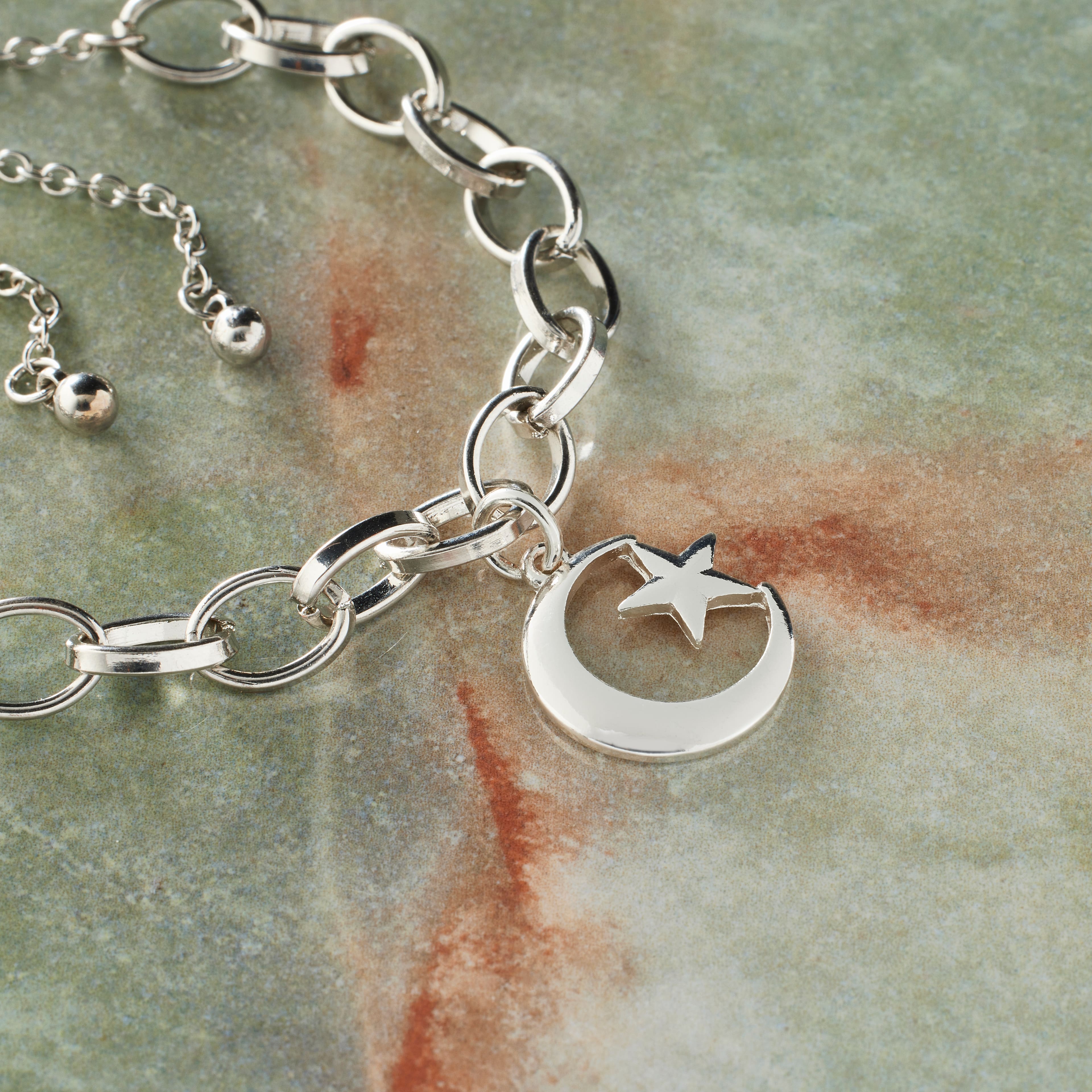 12 Pack: Silver Plated Star & Moon Charm by Bead Landing™
