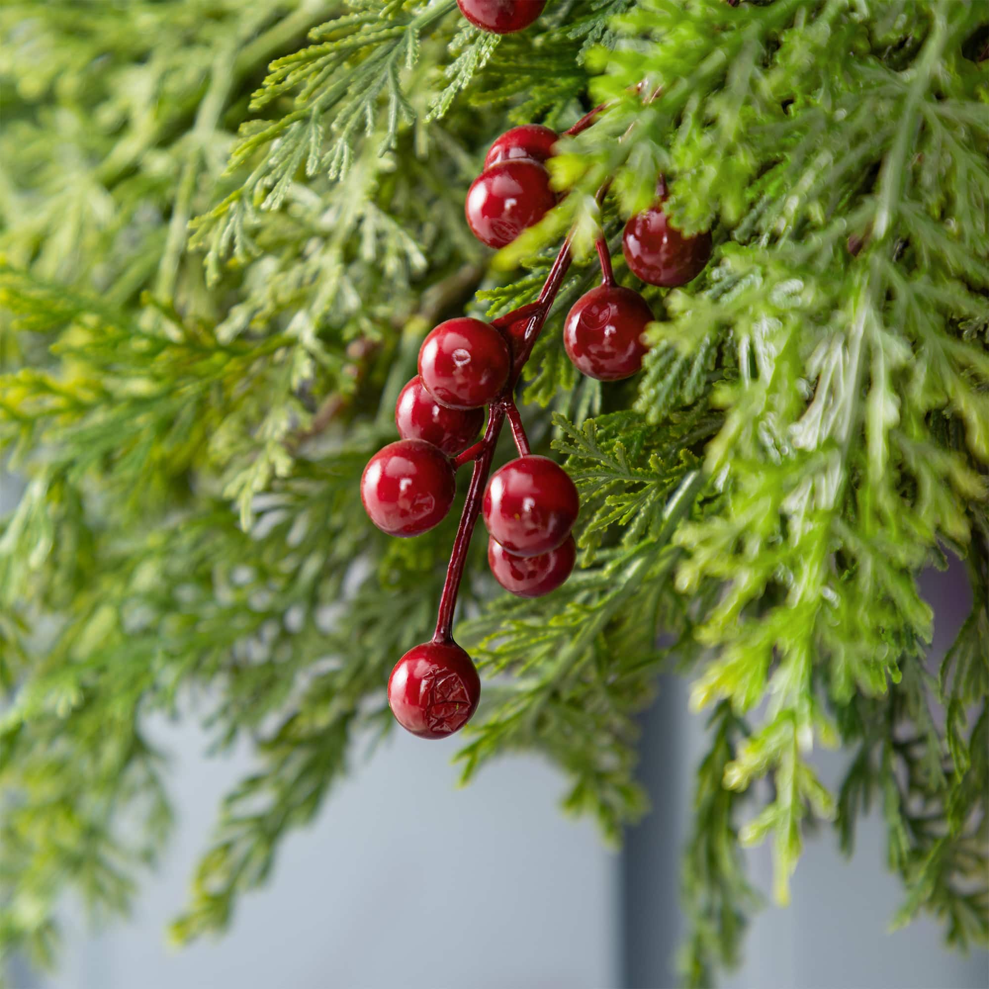 Glitzhome® 24"D Christmas Greenery PE Cedar Wreath with Red Berries
