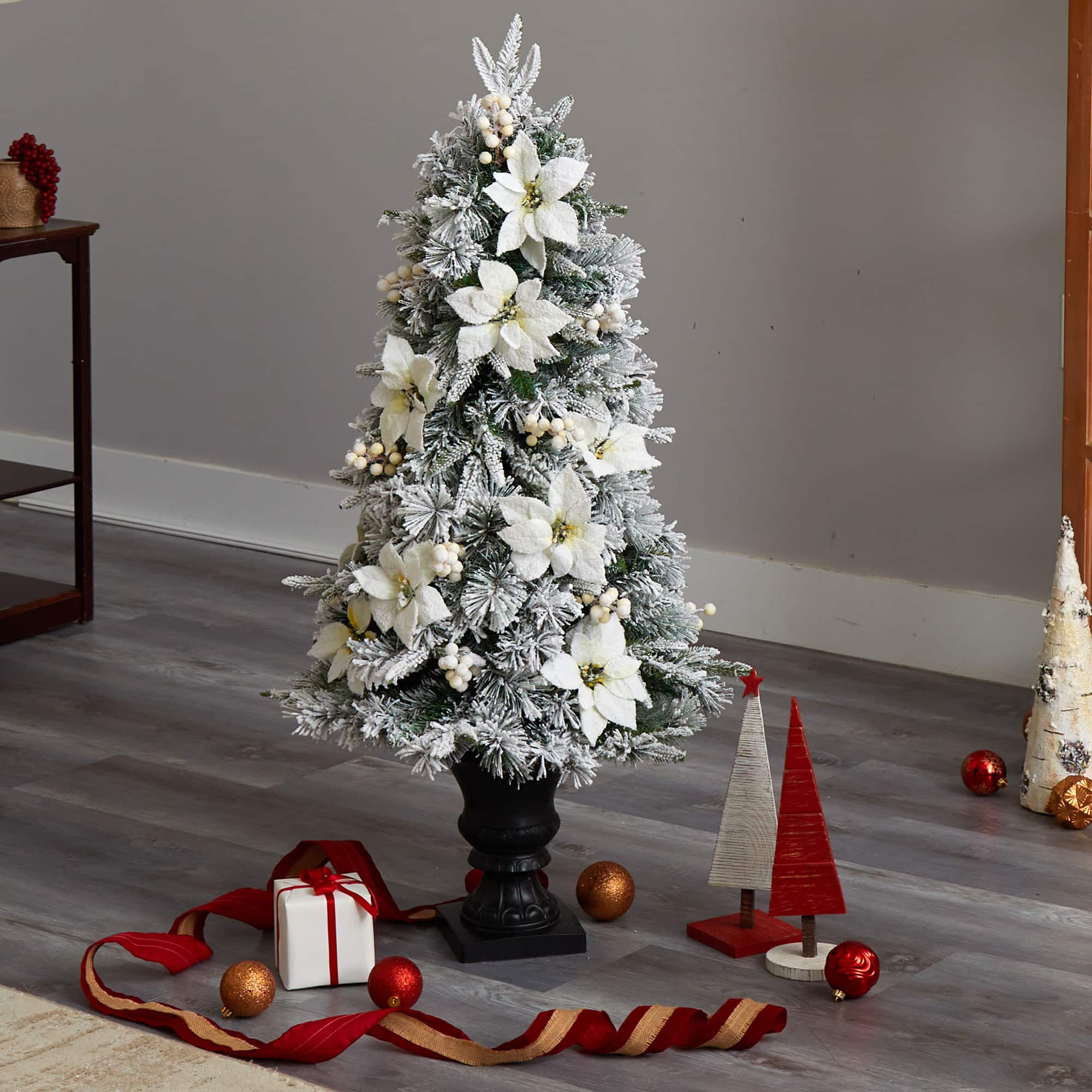 4ft. Pre-Lit Flocked Artificial Christmas Tree in Decorative Urn, Warm White Lights