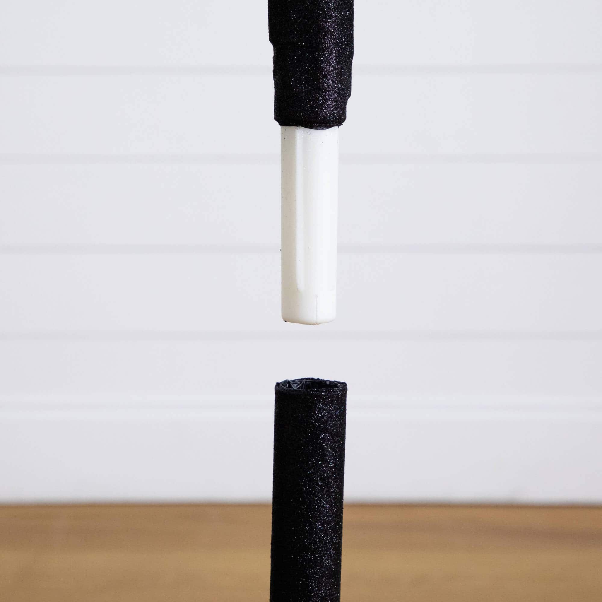 4ft. Pre-Lit Artificial Halloween Spider Twig Tree with 48 Purple LED Lights