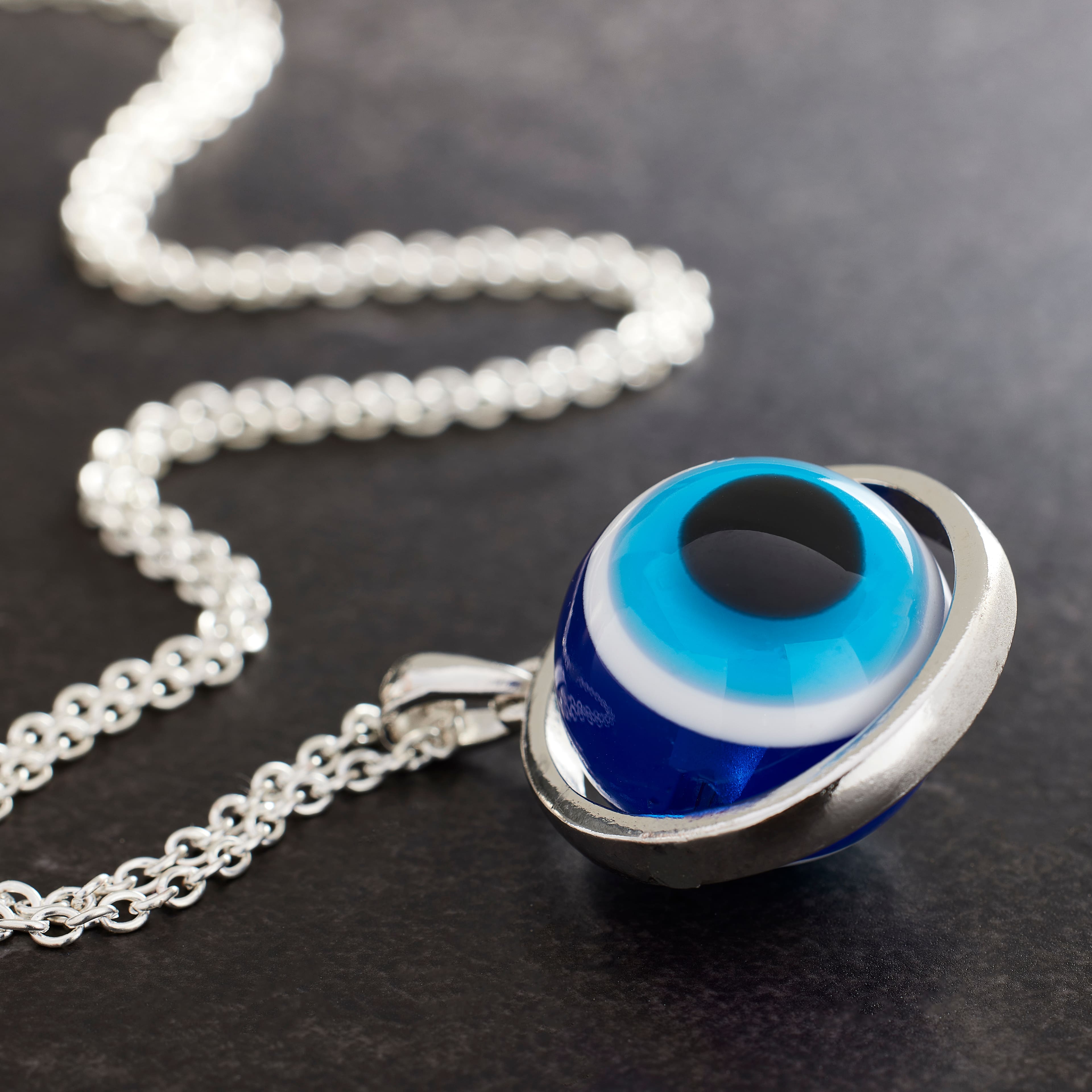 12 Pack: Blue Evil Eye Spinner Pendant by Bead Landing™