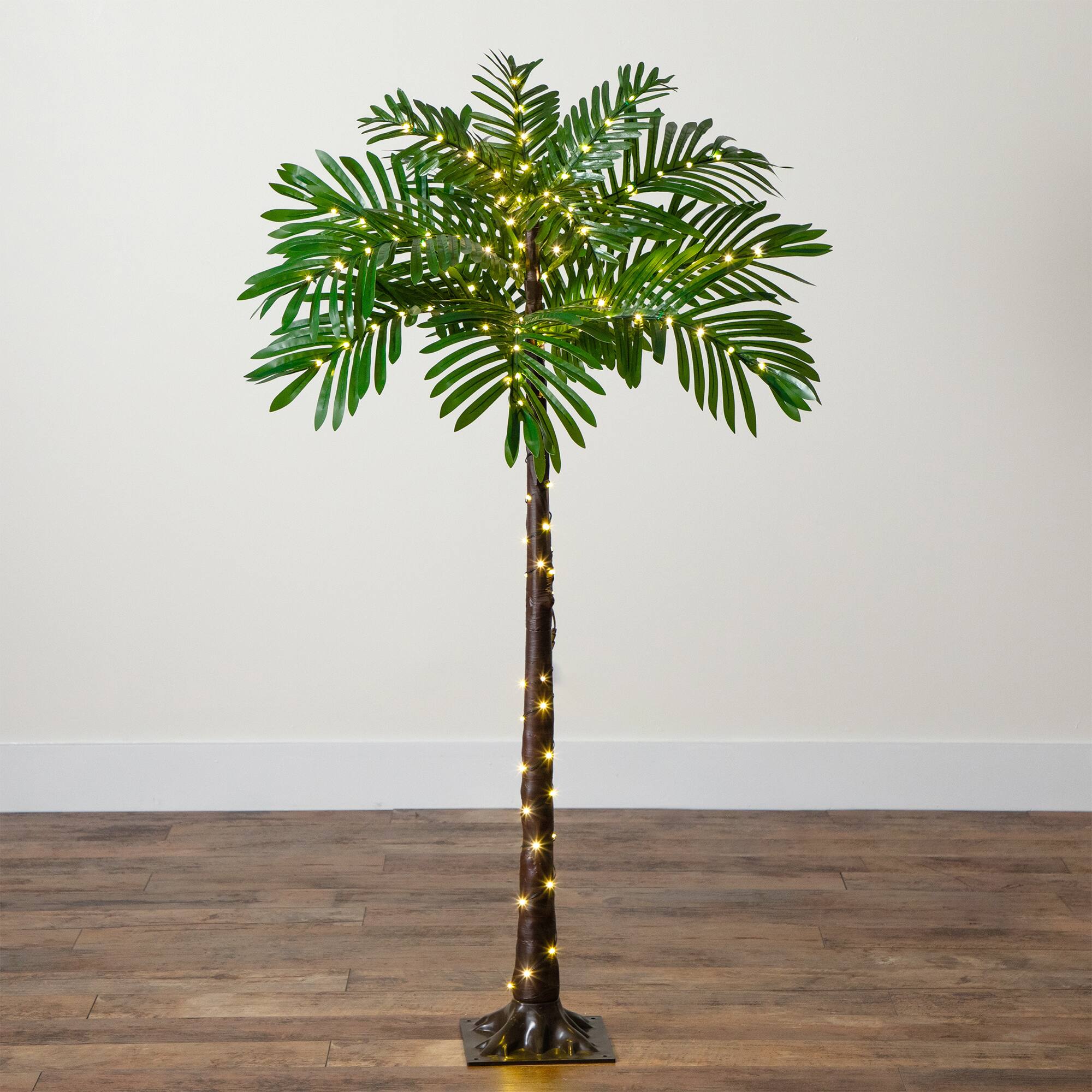 4ft. Pre-Lit UV Resistant Artificial Palm Tree with Warm White LED Lights