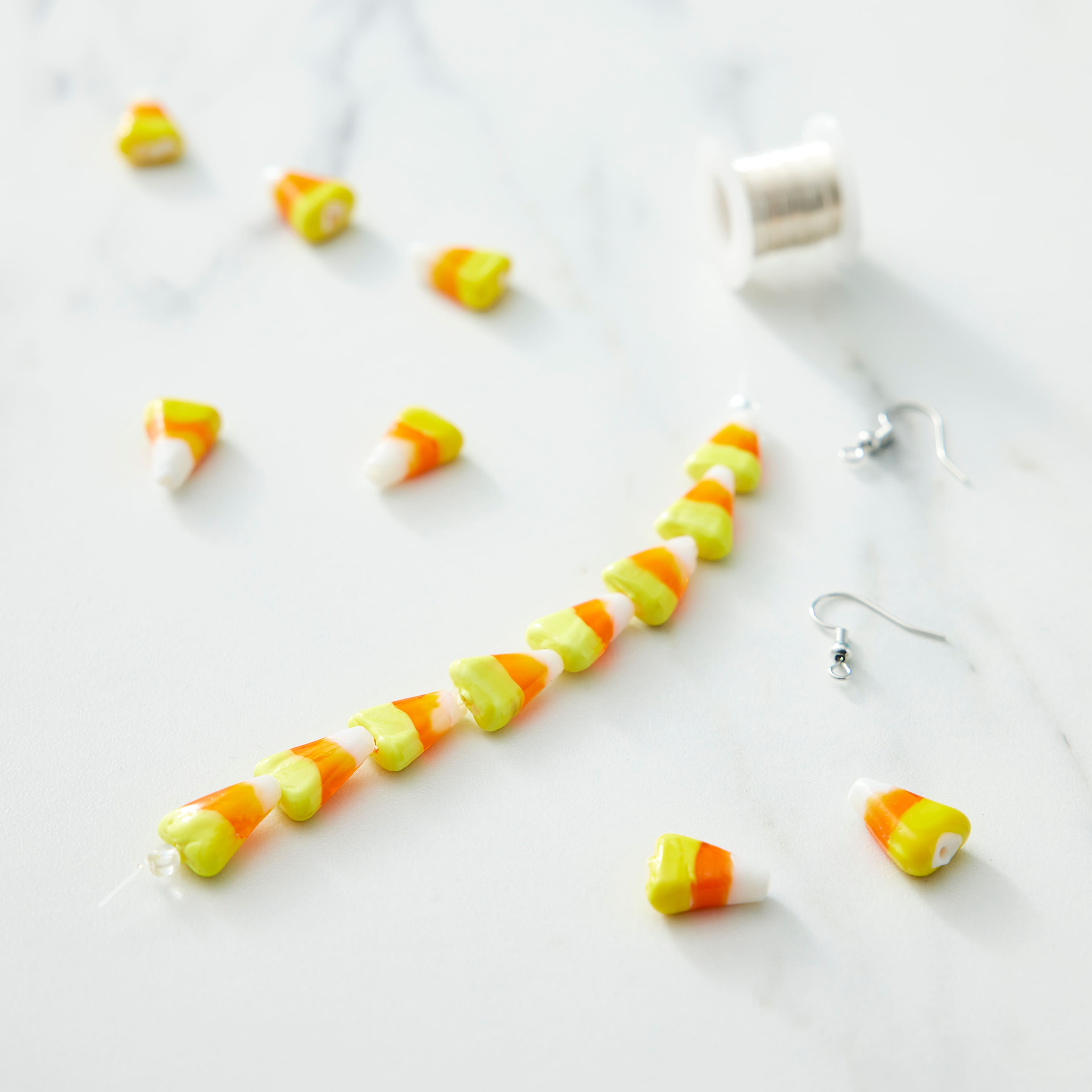 12 Pack: Yellow, Orange &#x26; White Candy Corn Glass Beads, 15mm by Bead Landing&#x2122;