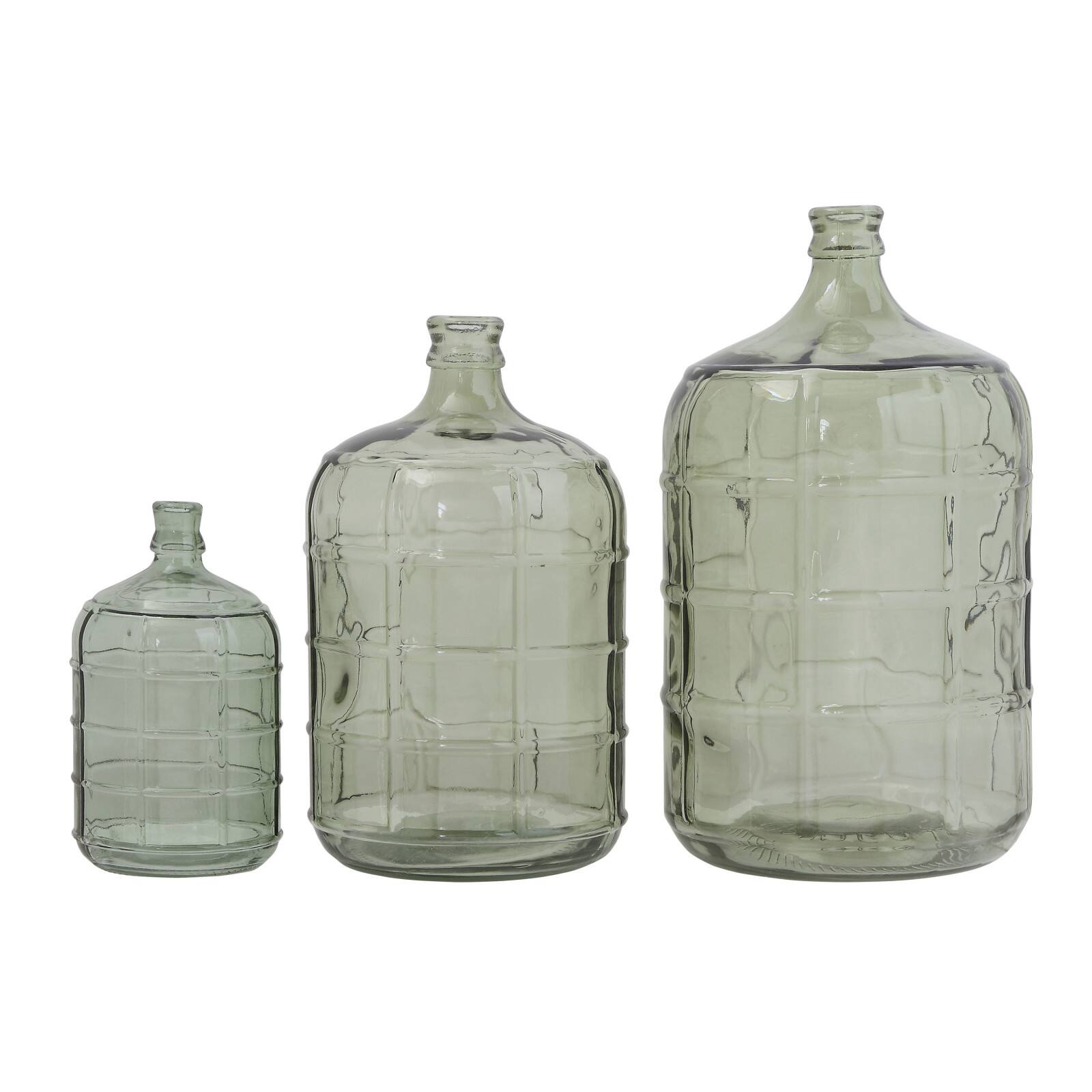Hello Honey&#xAE; 19.25&#x22; Transparent Green Vintage Glass Bottle with Embossed Windowpane Design