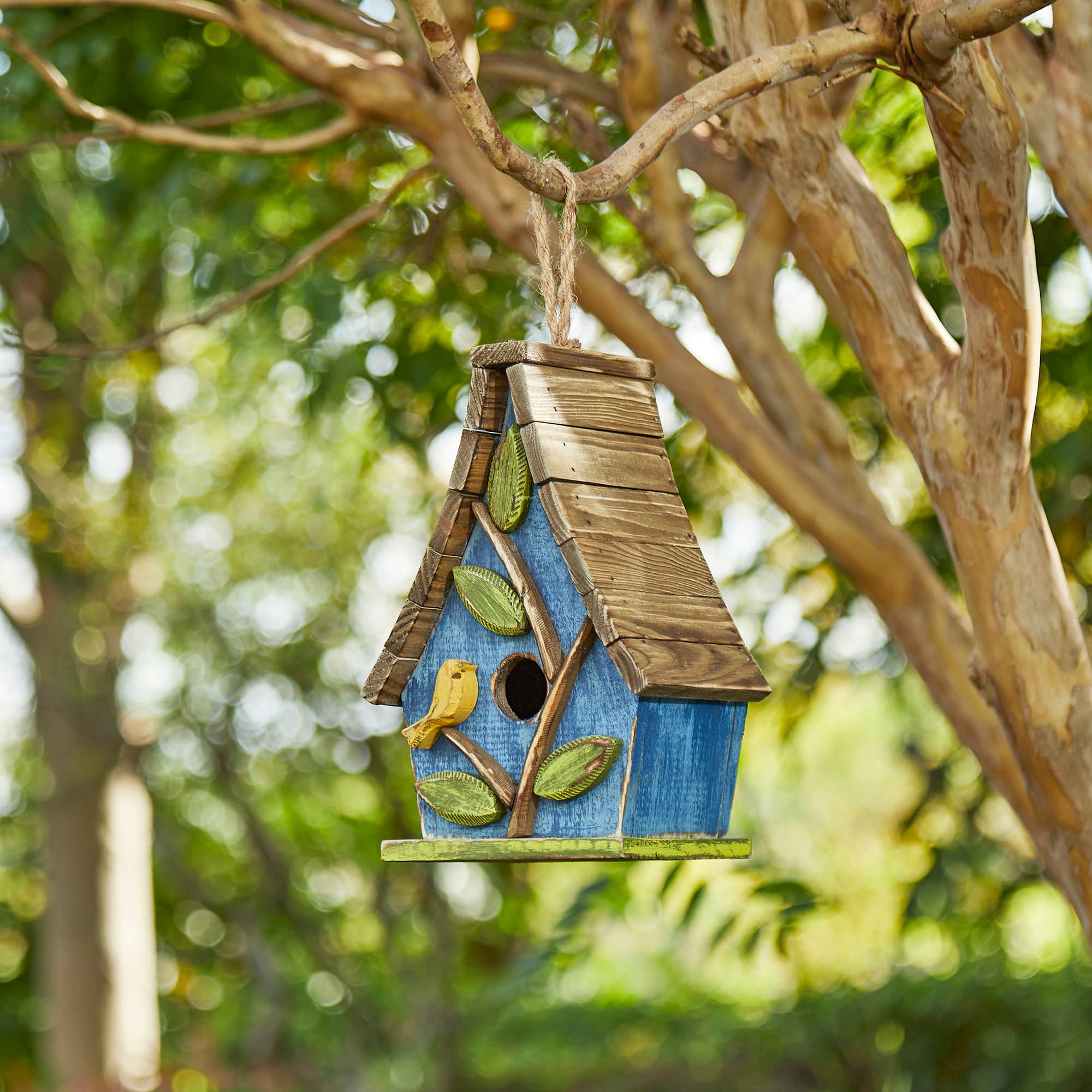 Glitzhome® 12.5" Distressed Wood Birdhouse with Leaves