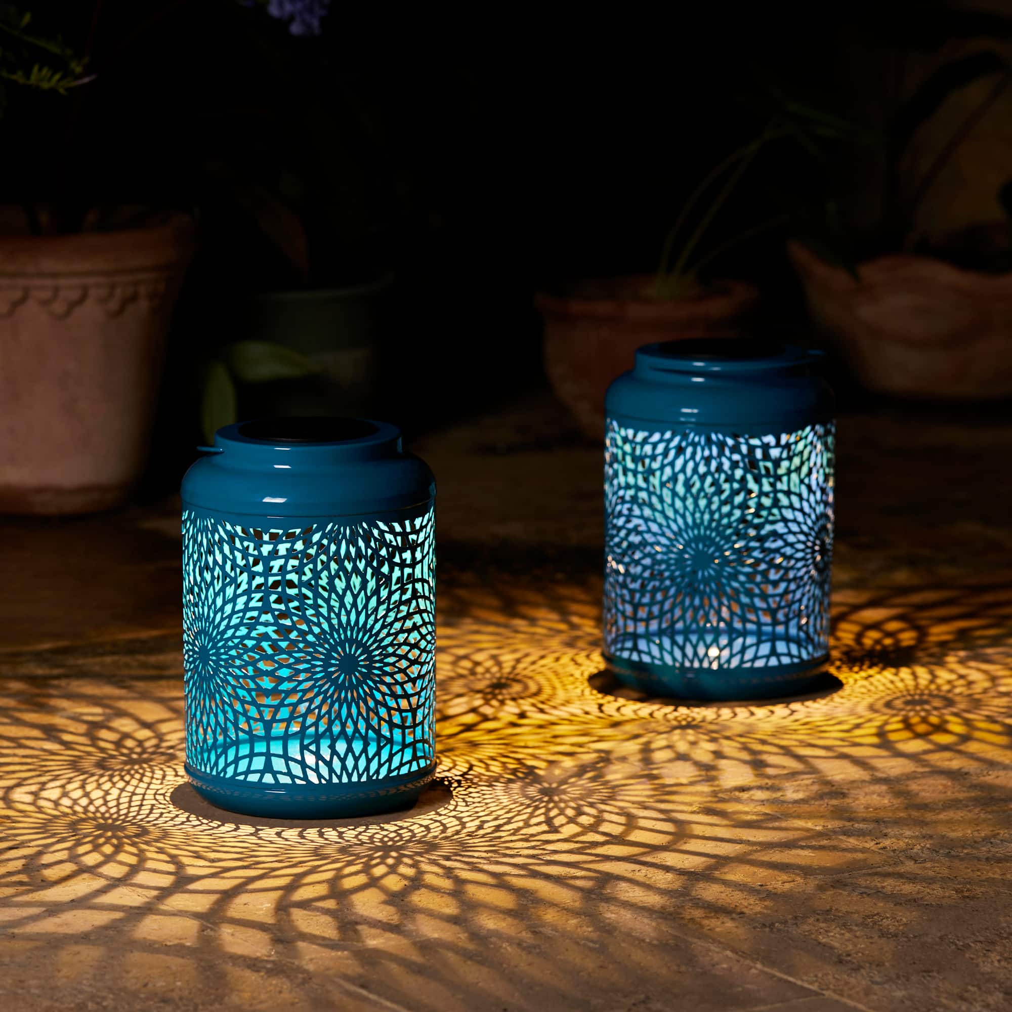 Glitzhome® 8.75" Metal Cutout Solar Powered Hanging Lantern Set