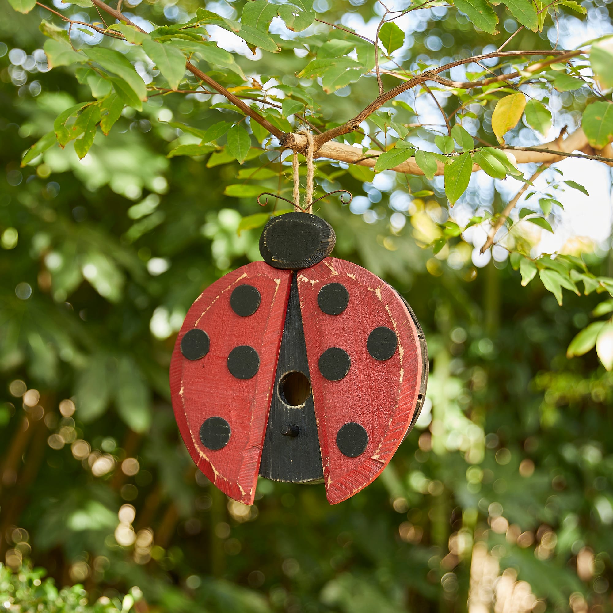 Glitzhome® 11.5" Distressed Wood Ladybug Birdhouse