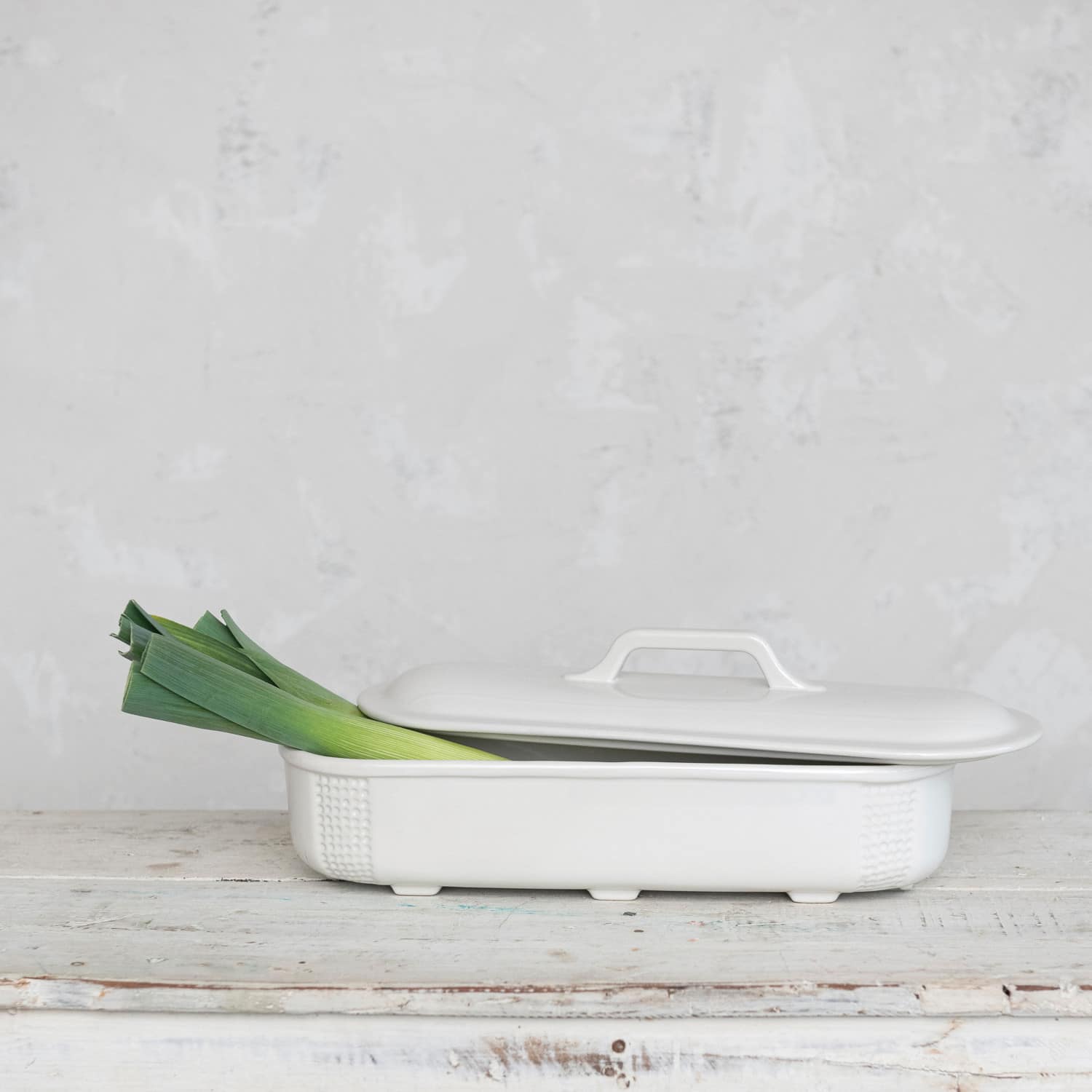 15.5&#x22; Matte White Oval 2qt. Debossed Stoneware Baking Dish with Lid