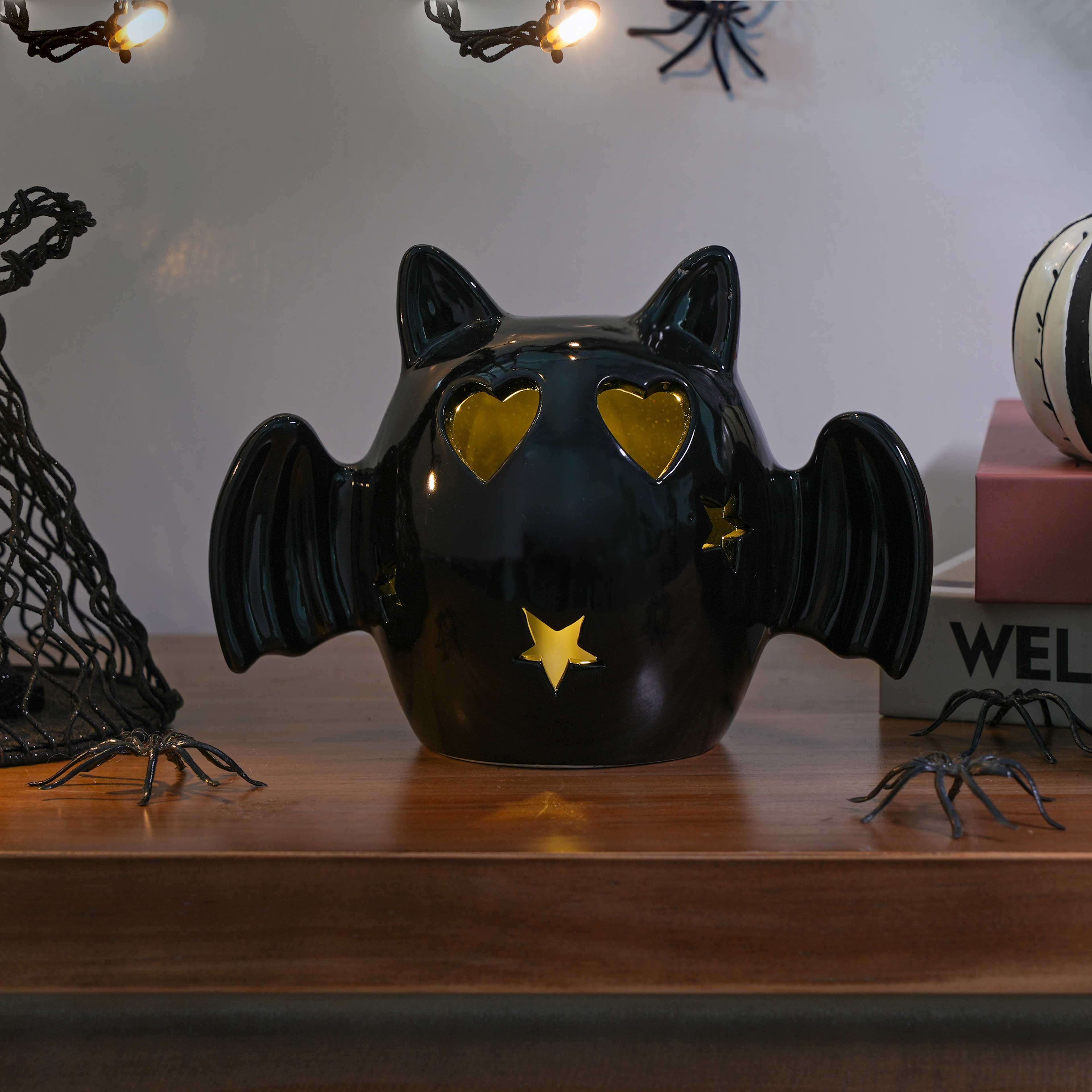 6.5&#x22; Black Bat with Heart Eyes LED Ceramic Tabletop D&#xE9;cor by Ashland&#xAE;