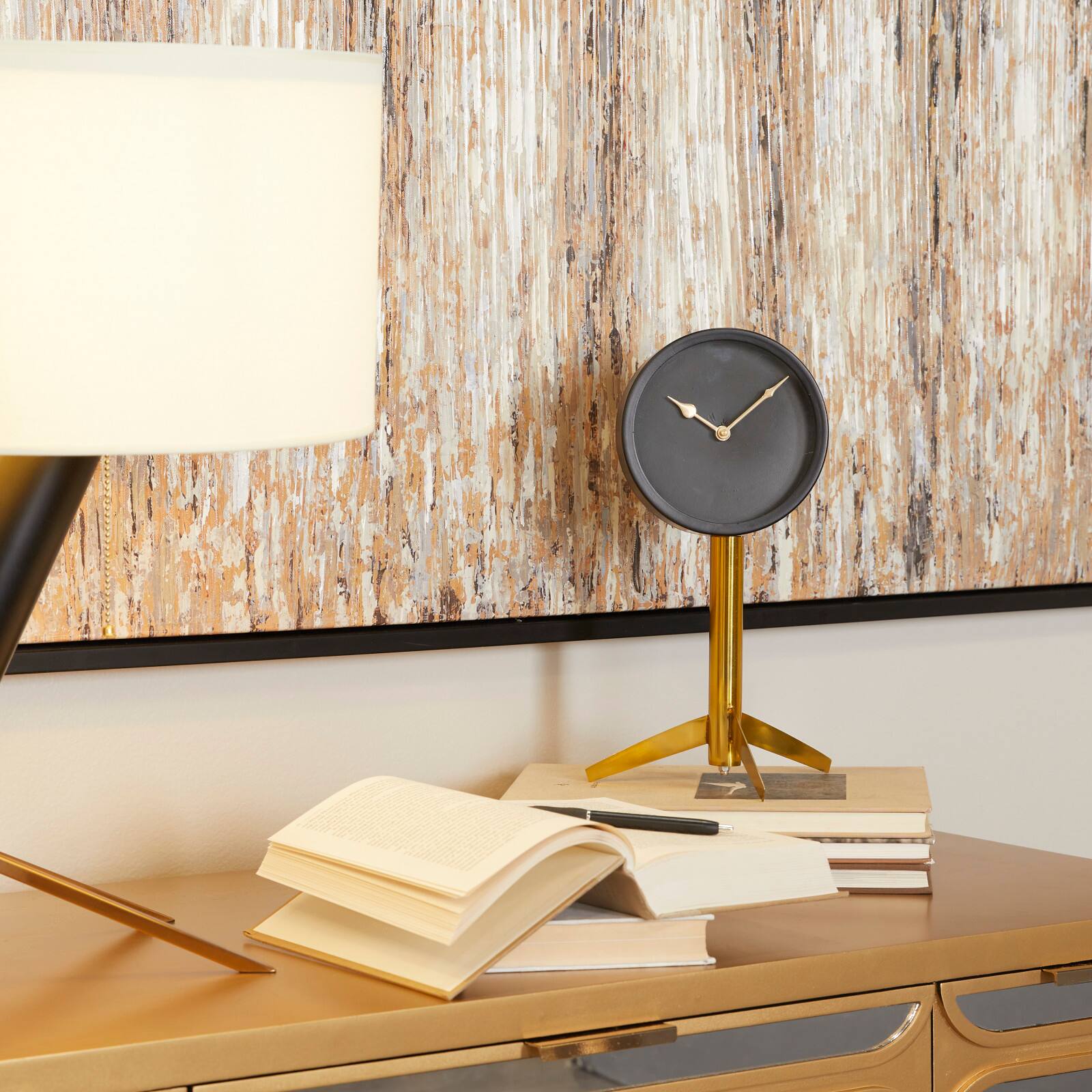 The Novogratz 13" Black Stainless Steel Clock with Gold Stand