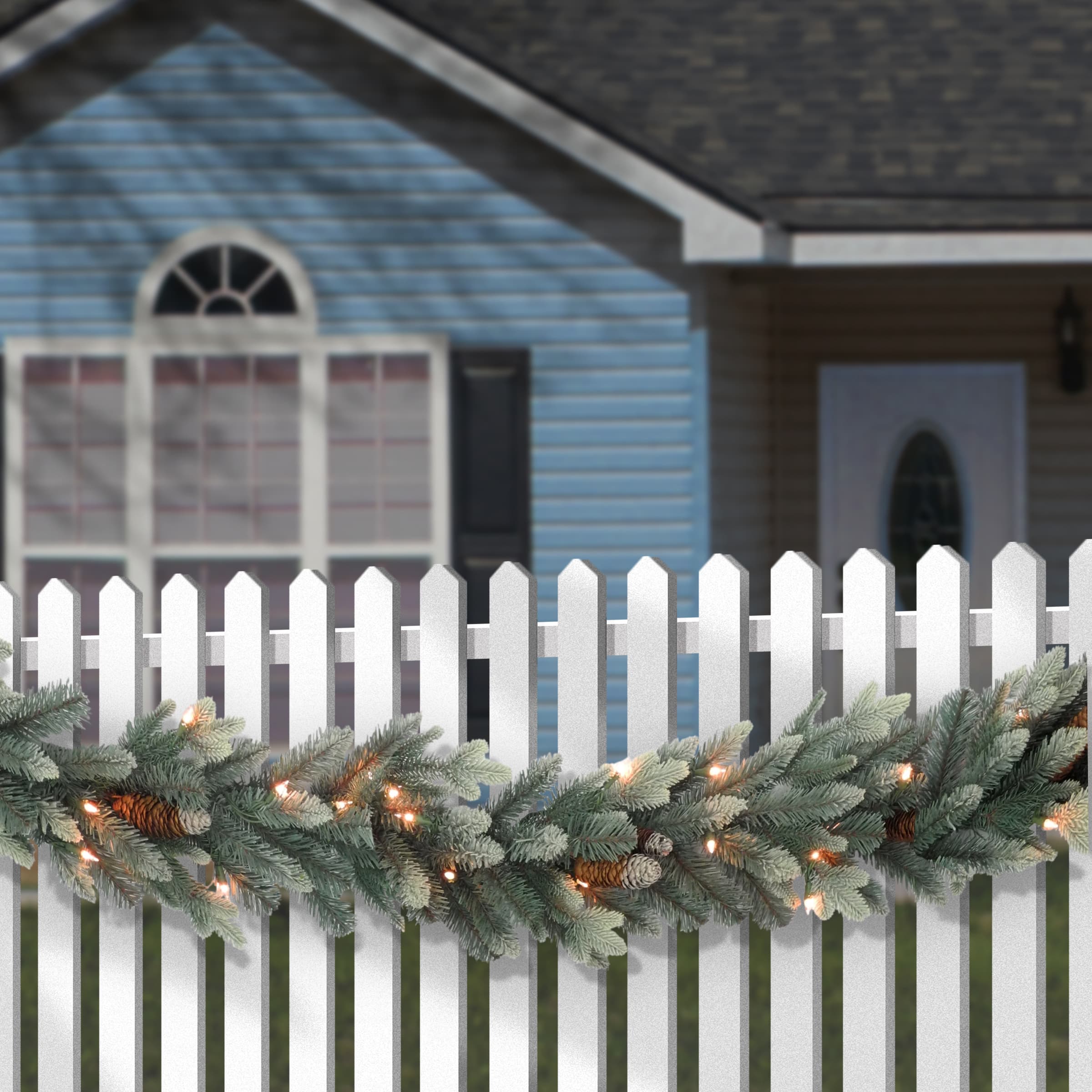 9ft. Pre-lit Copenhagen Artificial Christmas Spruce Garland with Flocked Cones &#x26; 50 Clear Lights