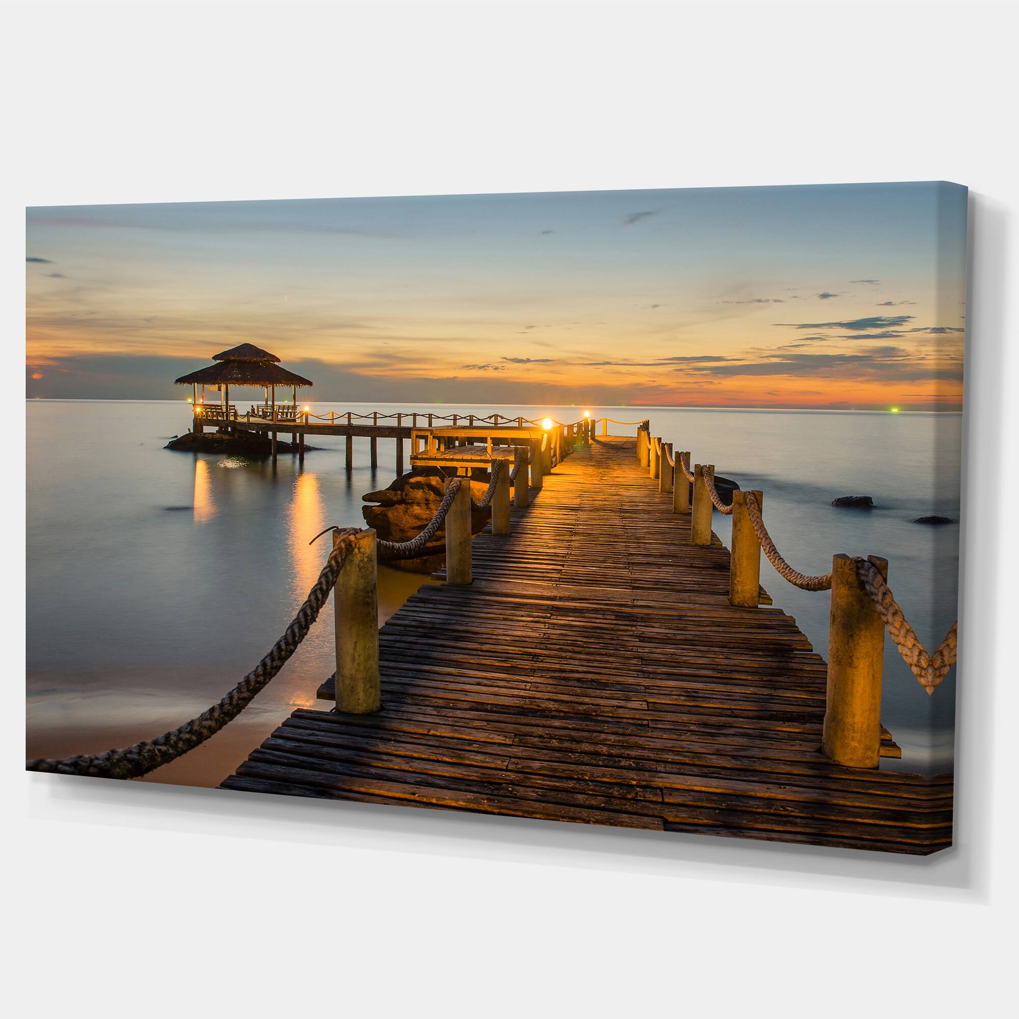 Designart - Brown Wooden Pier in Evening - Seashore Photo Canvas Print
