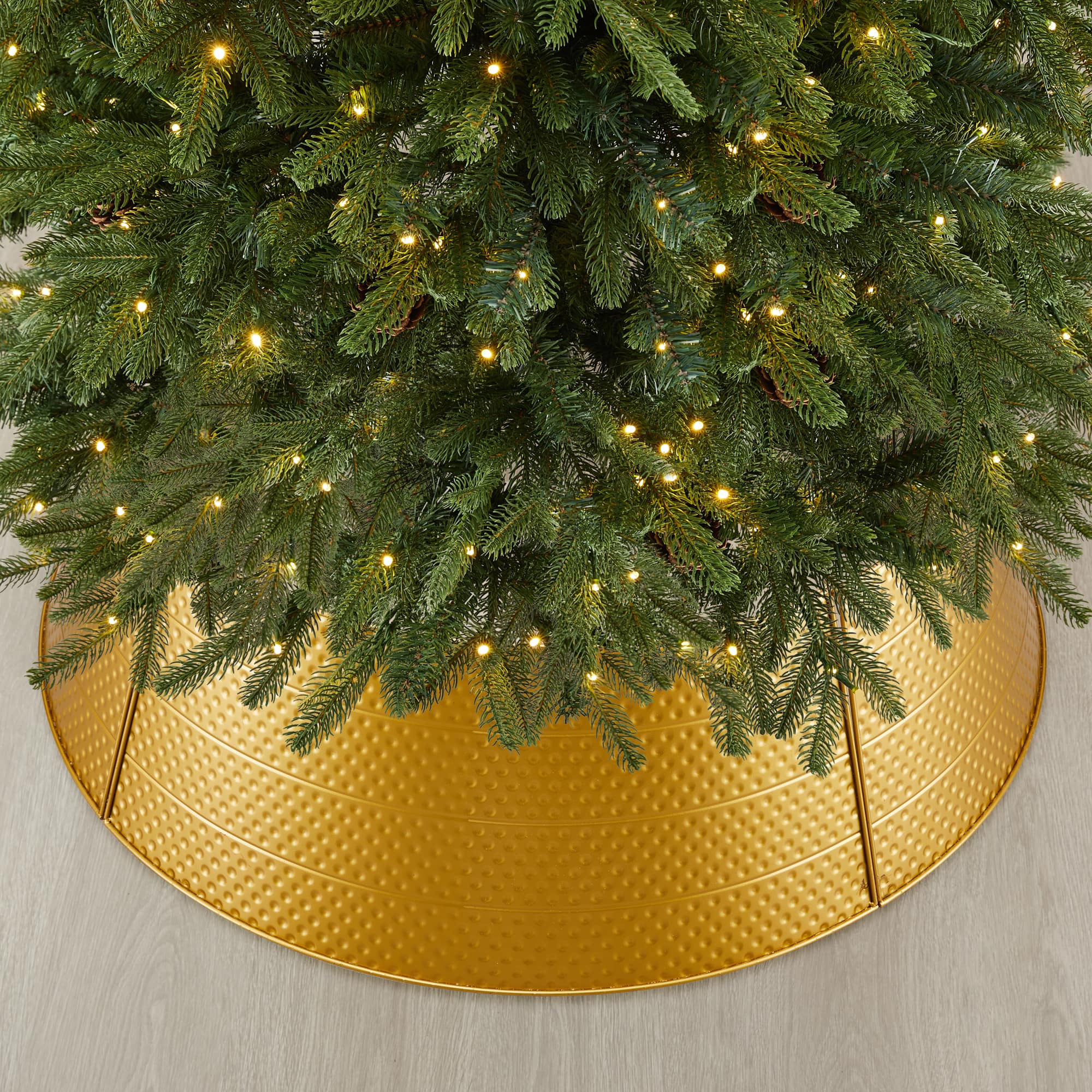 Glitzhome® 40.5" Christmas Gold Hammered Metal Tree Collar Tree Gold Christmas Tree Collar