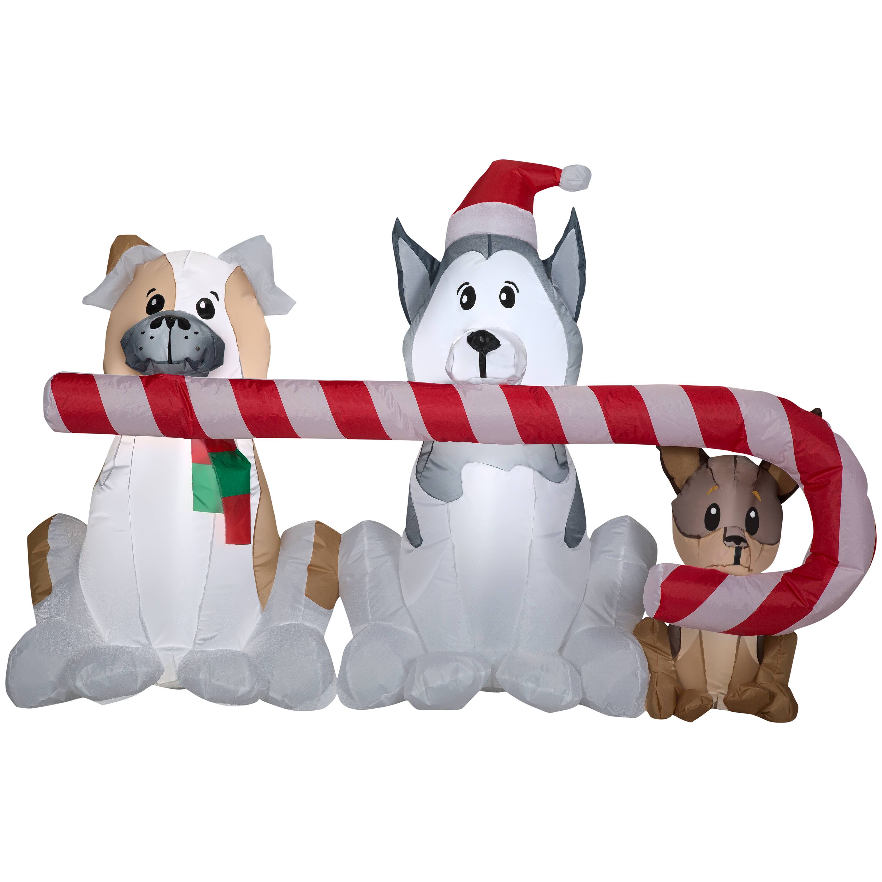 5.5ft. Airblown® Inflatable Christmas Puppies with Big Candy Cane