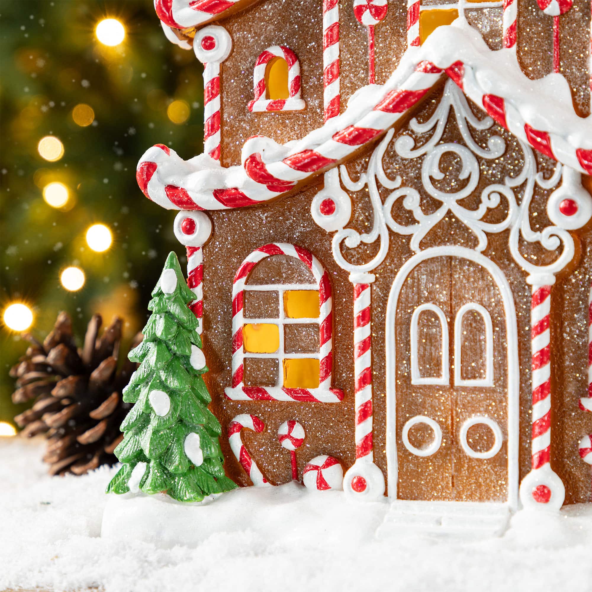 Glitzhome&#xAE; 11.75&#x22; Christmas Lighted Resin Village Table Decor