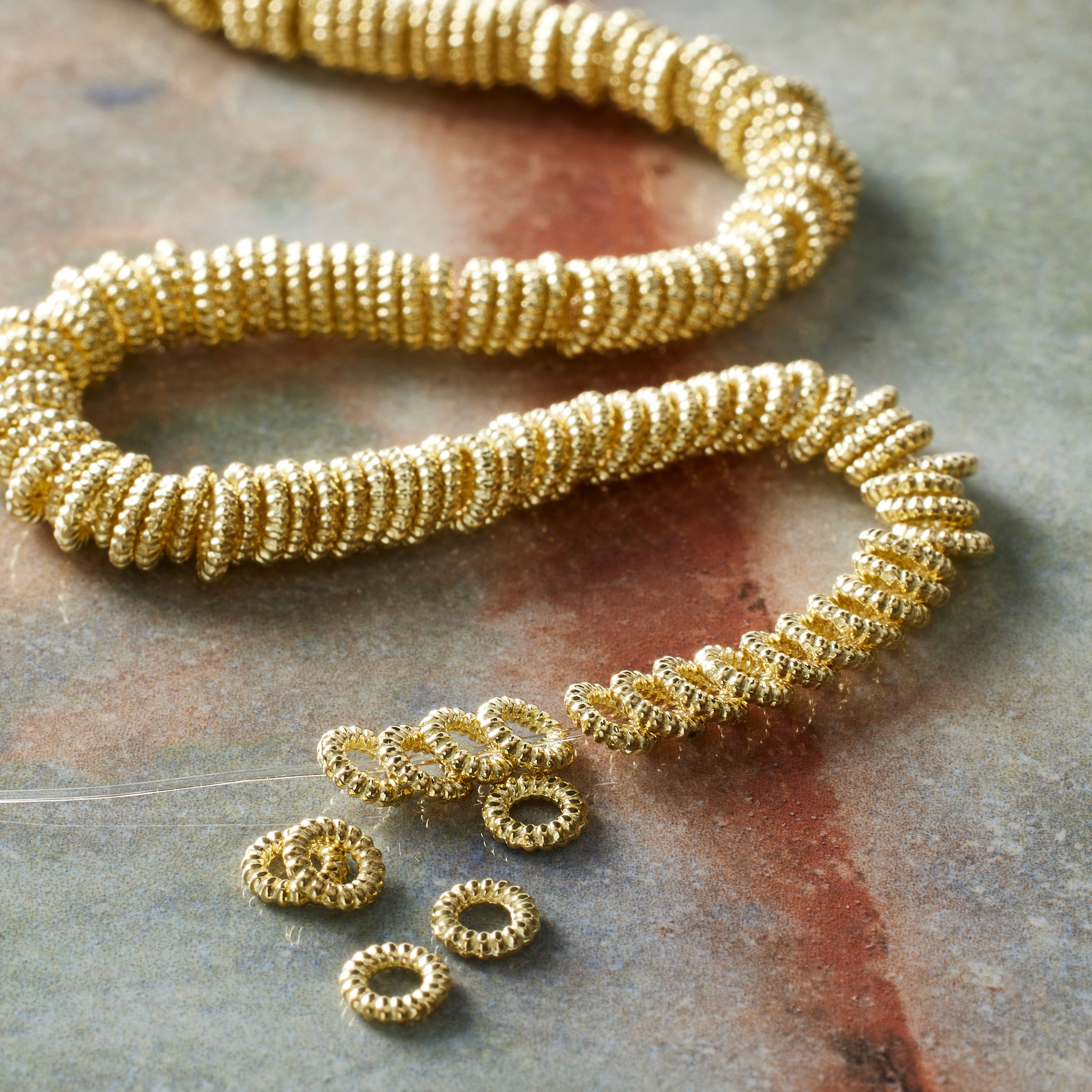12 Pack: Gold Metal Rondelle Beads, 4mm by Bead Landing&#x2122;