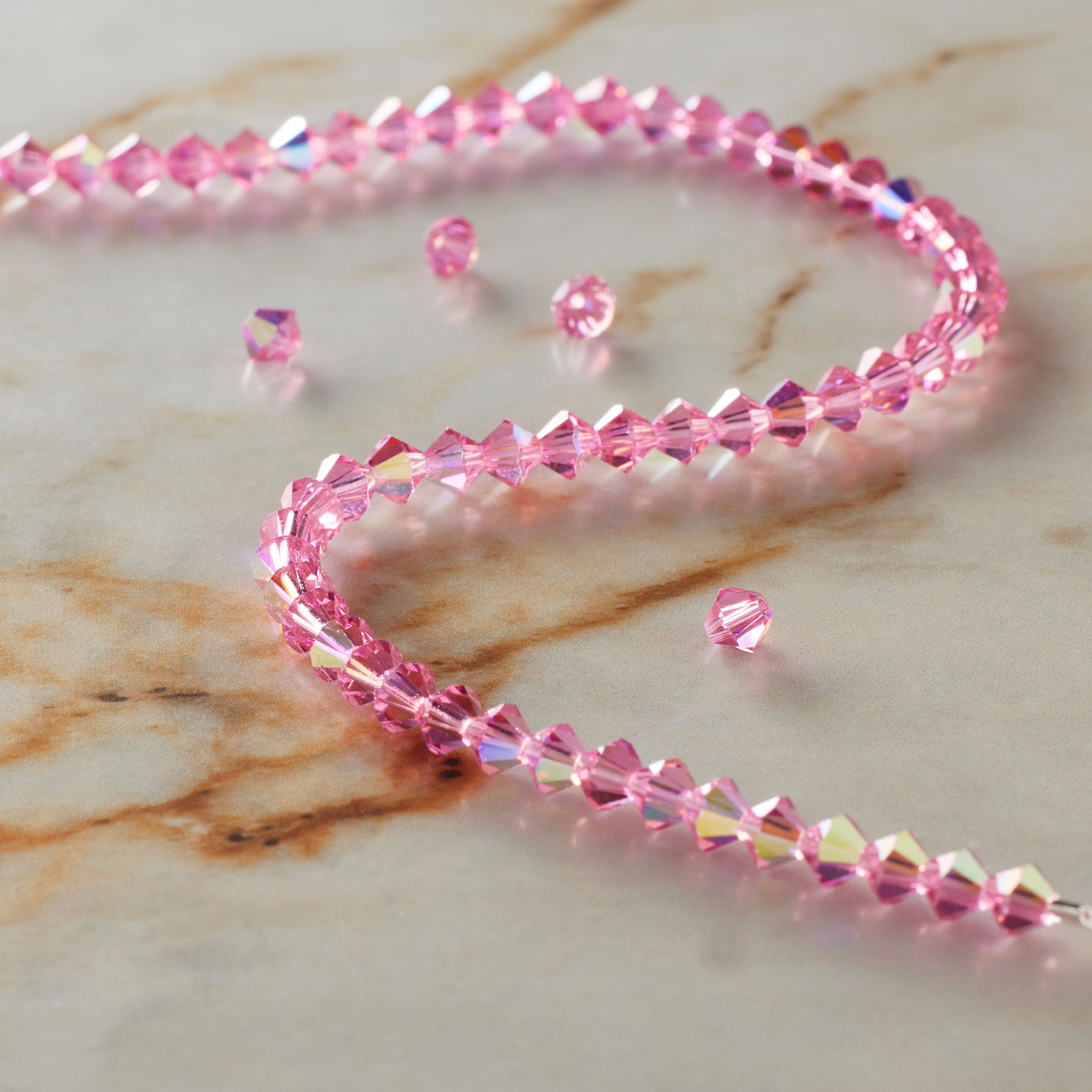 12 Pack: Preciosa Glass Crystal Bicone Beads, 4mm by Bead Landing™