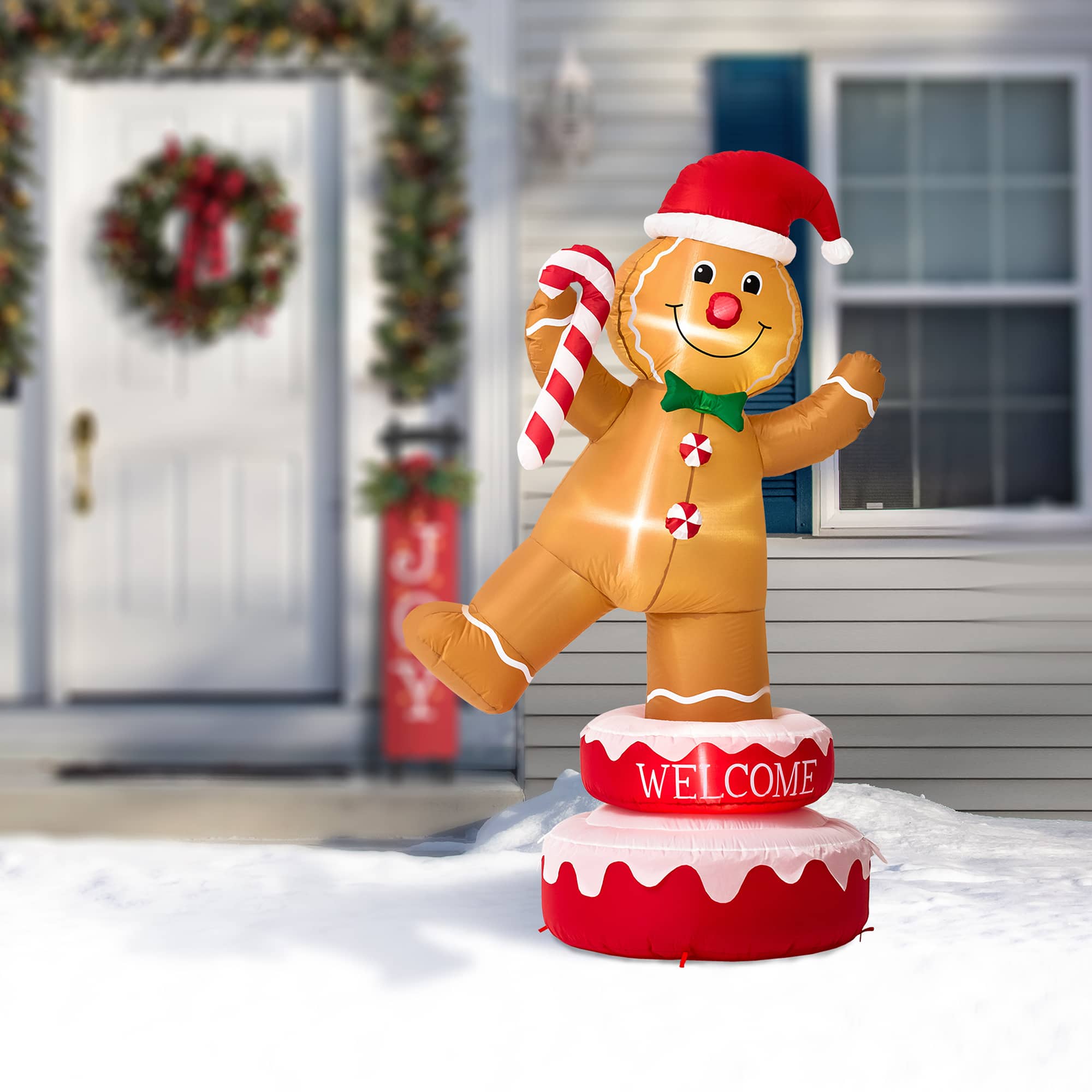 Glitzhome&#xAE; 6ft. Lighted Inflatable Rotating Gingerbread Man D&#xE9;cor
