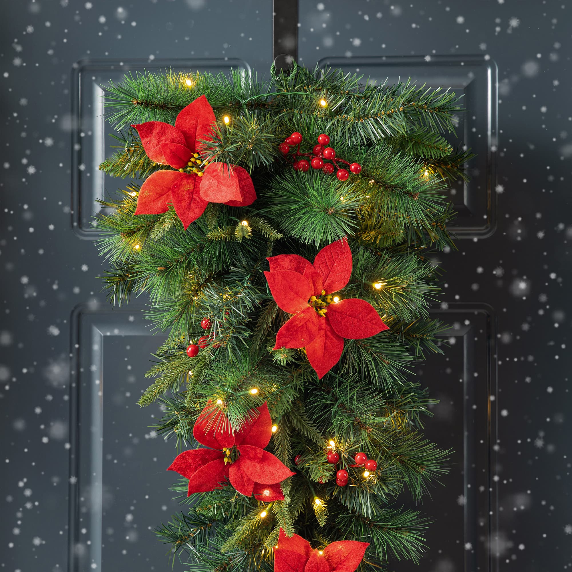 Glitzhome&#xAE; 3ft. Pre-Lit Pine, Poinsettia &#x26; Berries Christmas Teardrop Swag