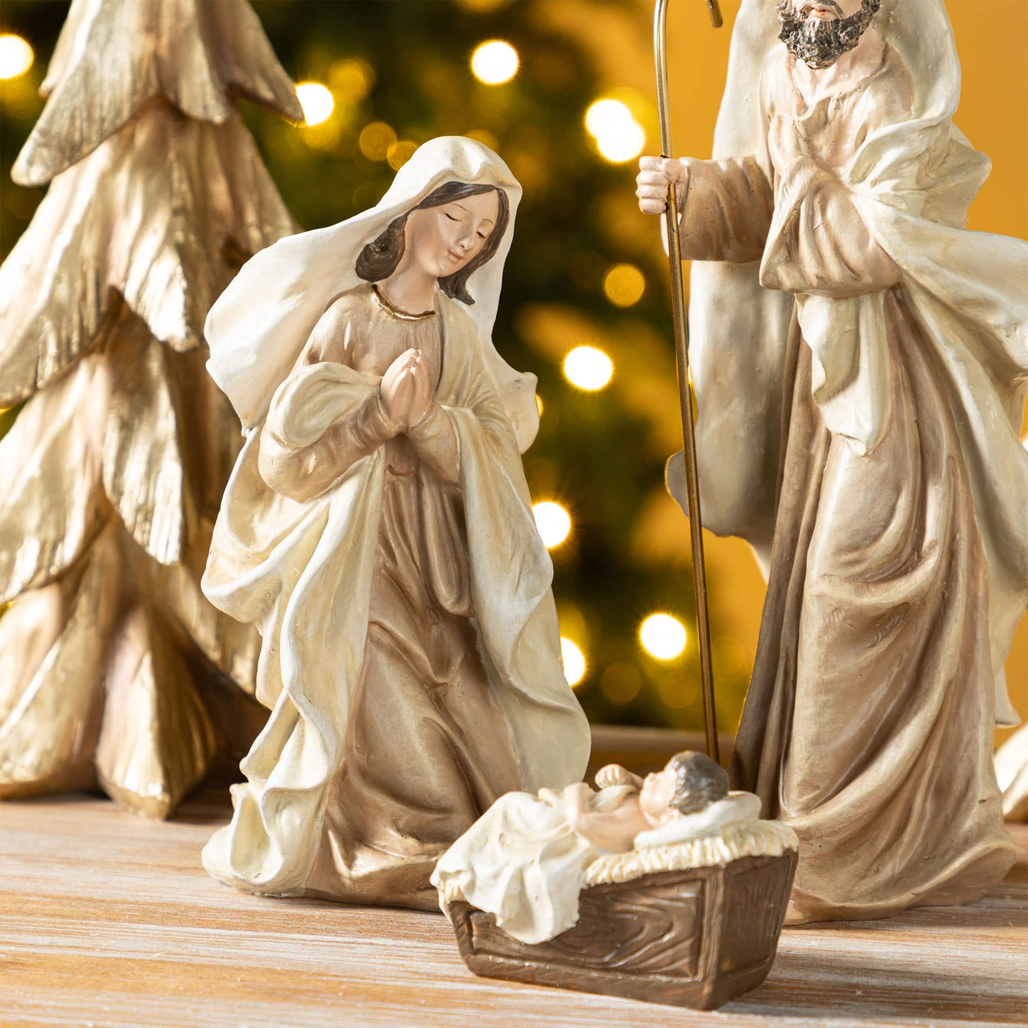 Glitzhome&#xAE; 5-Piece Gold Resin Holy Family with Christmas Trees Set