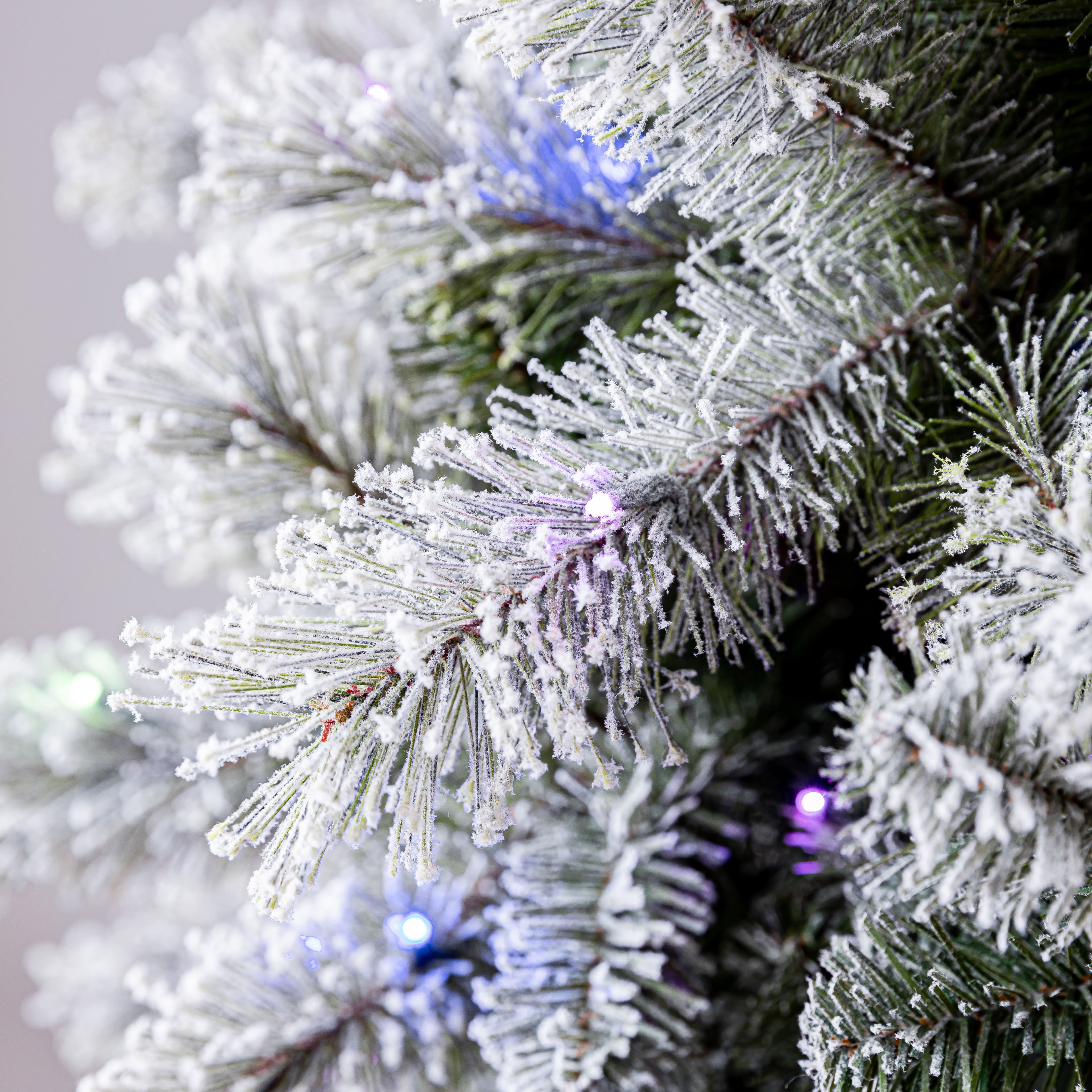 7.5ft. Pre-Lit Montreal Flocked Artifical Christmas Tree, LumaDazzle&#x2122; Color Changing Twinkle LED Lights by Ashland&#xAE; 