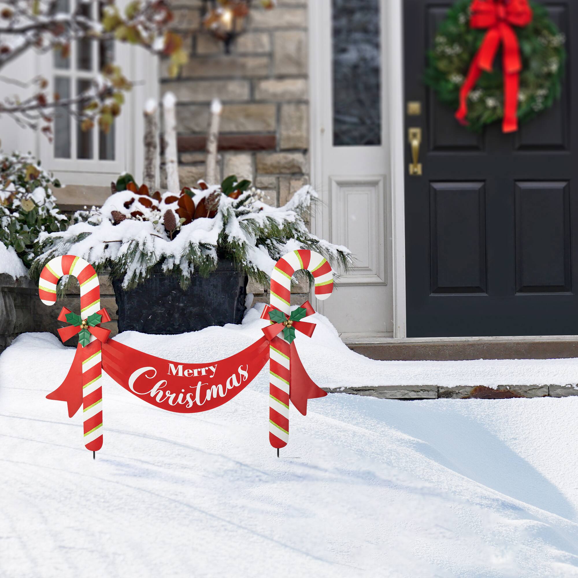 Glitzhome® 3ft. Merry Christmas Candy Cane Metal Yard Stake