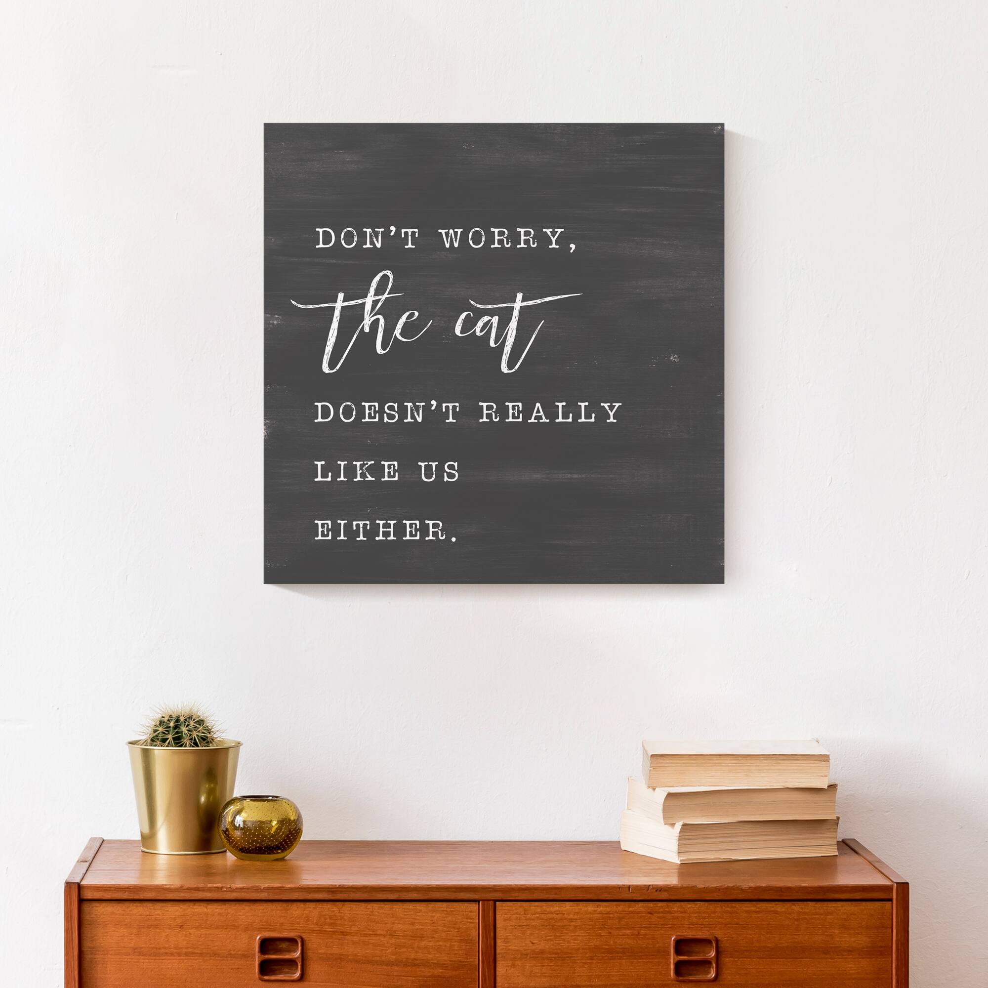 Cat Doesn't Like Us Either Canvas Wall Art