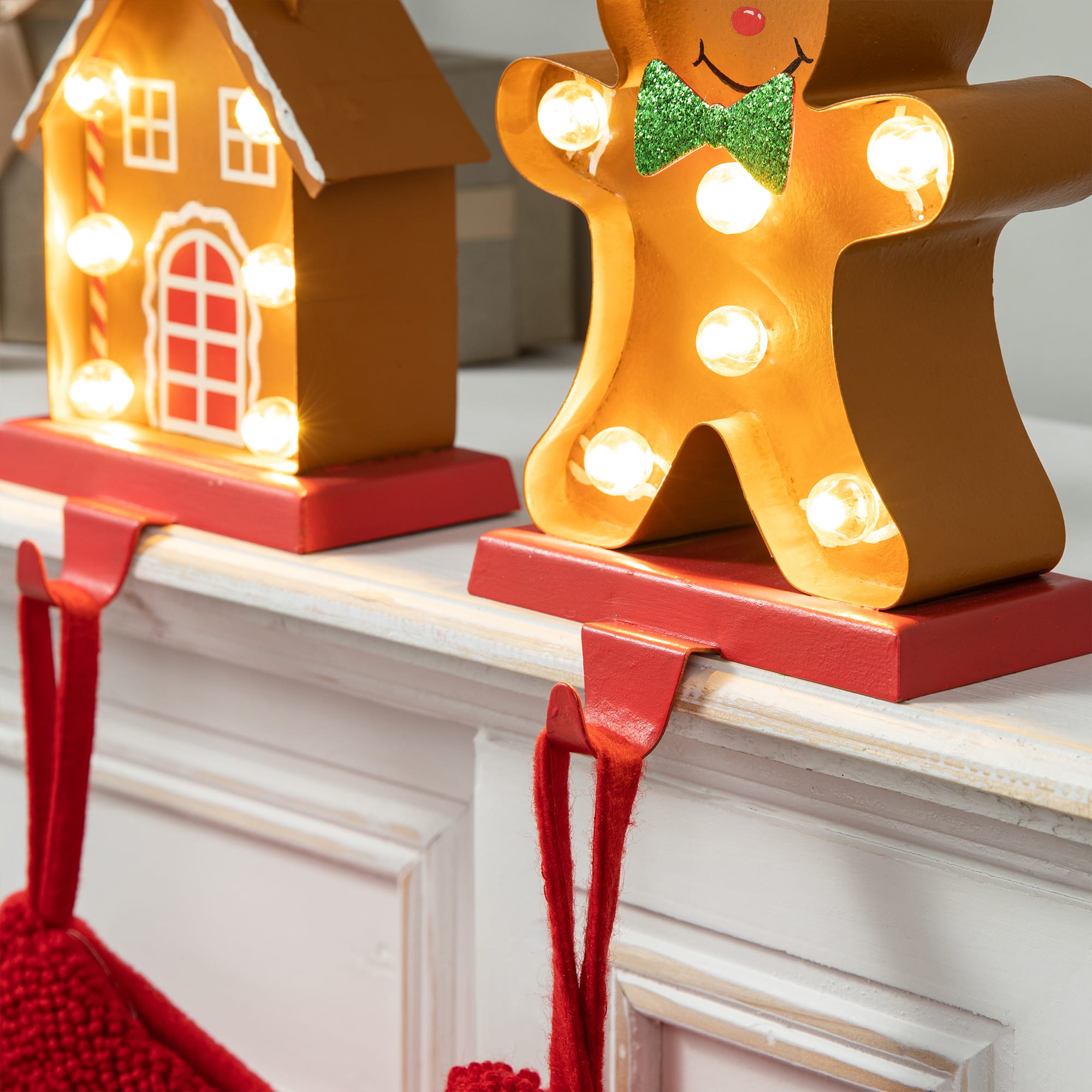 Glitzhome&#xAE; Marquee LED Gingerbread House &#x26; Gingerbread Man Christmas Stocking Holder Set