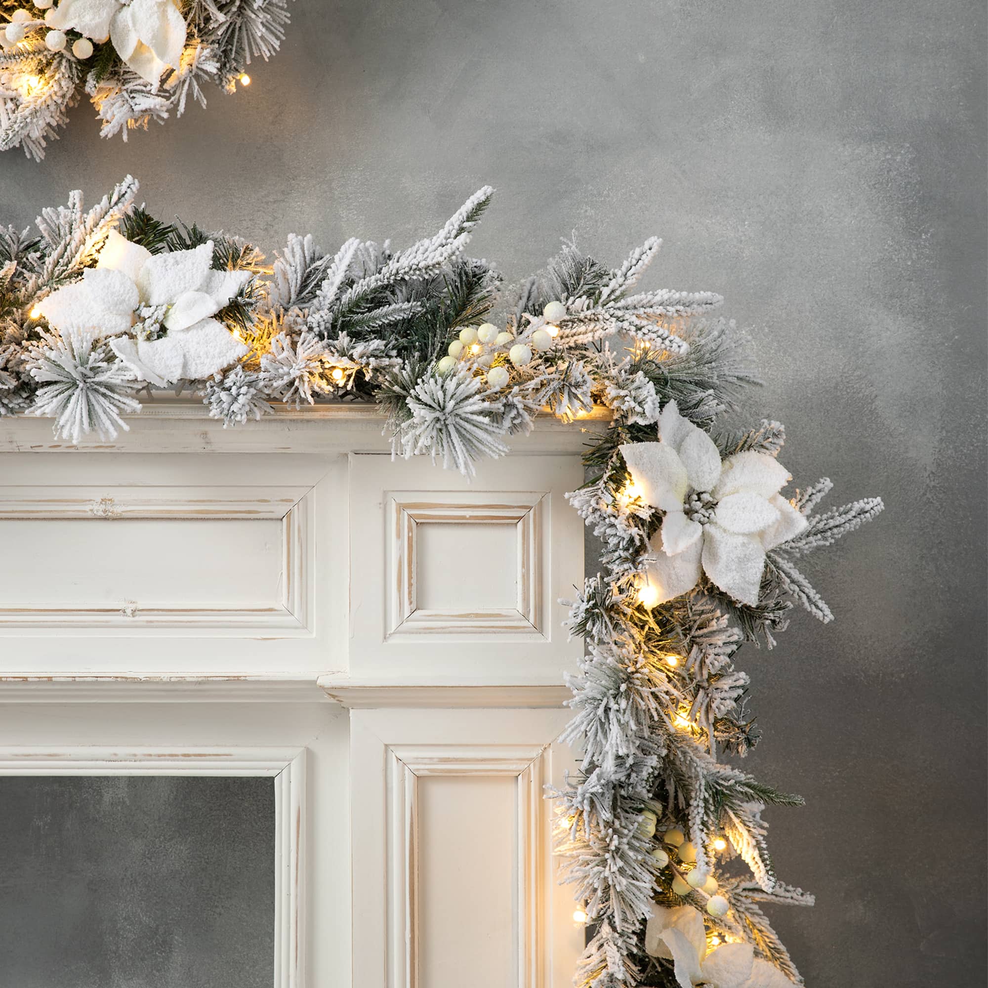 Glitzhome&#xAE; 24&#x22; Pre-Lit Snow Flocked Greenery Pine Poinsettia Christmas Wreath &#x26; Matched 2 Pack 9ft. Garland Set