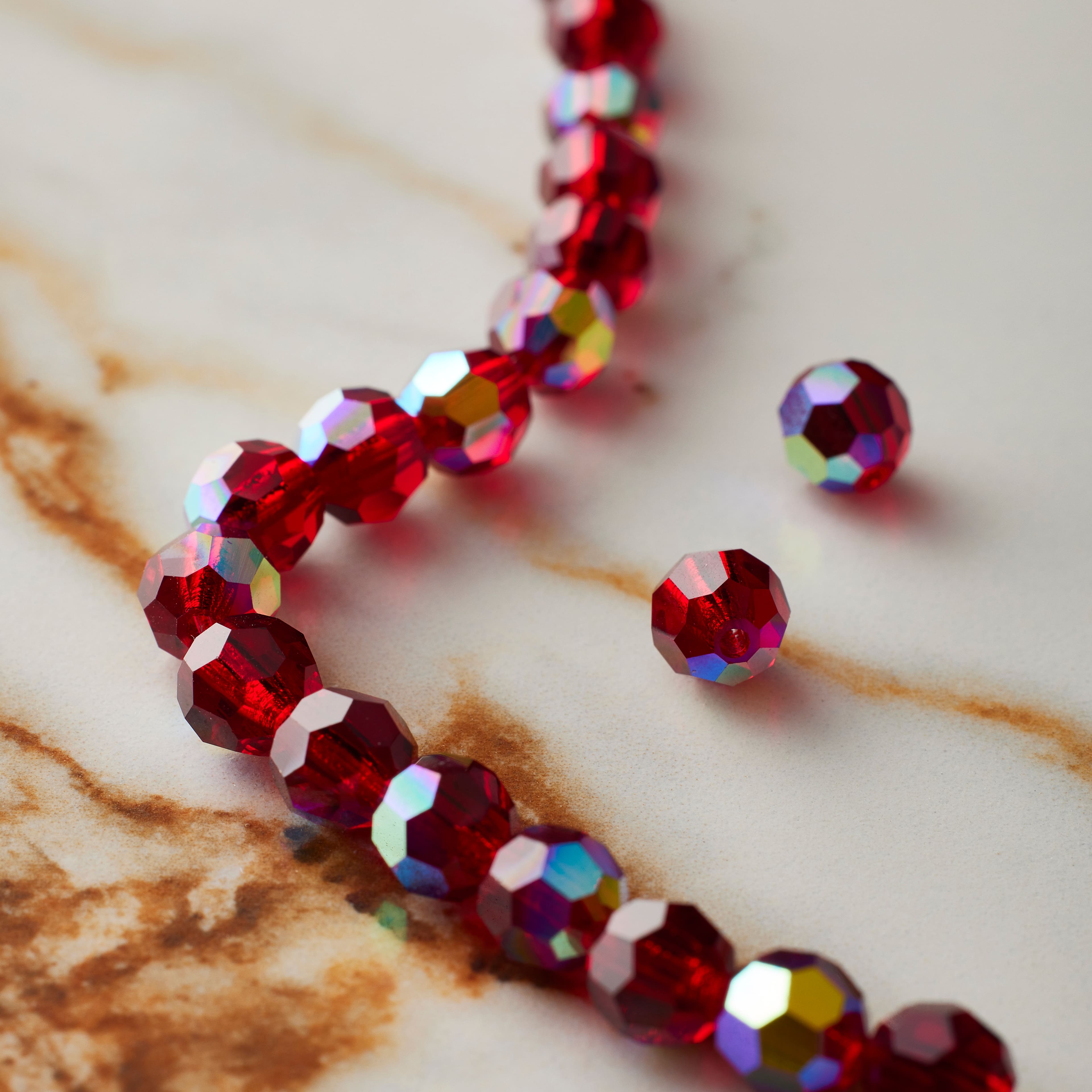 12 Pack: Preciosa Glass Crystal Round Beads, 6mm by Bead Landing™