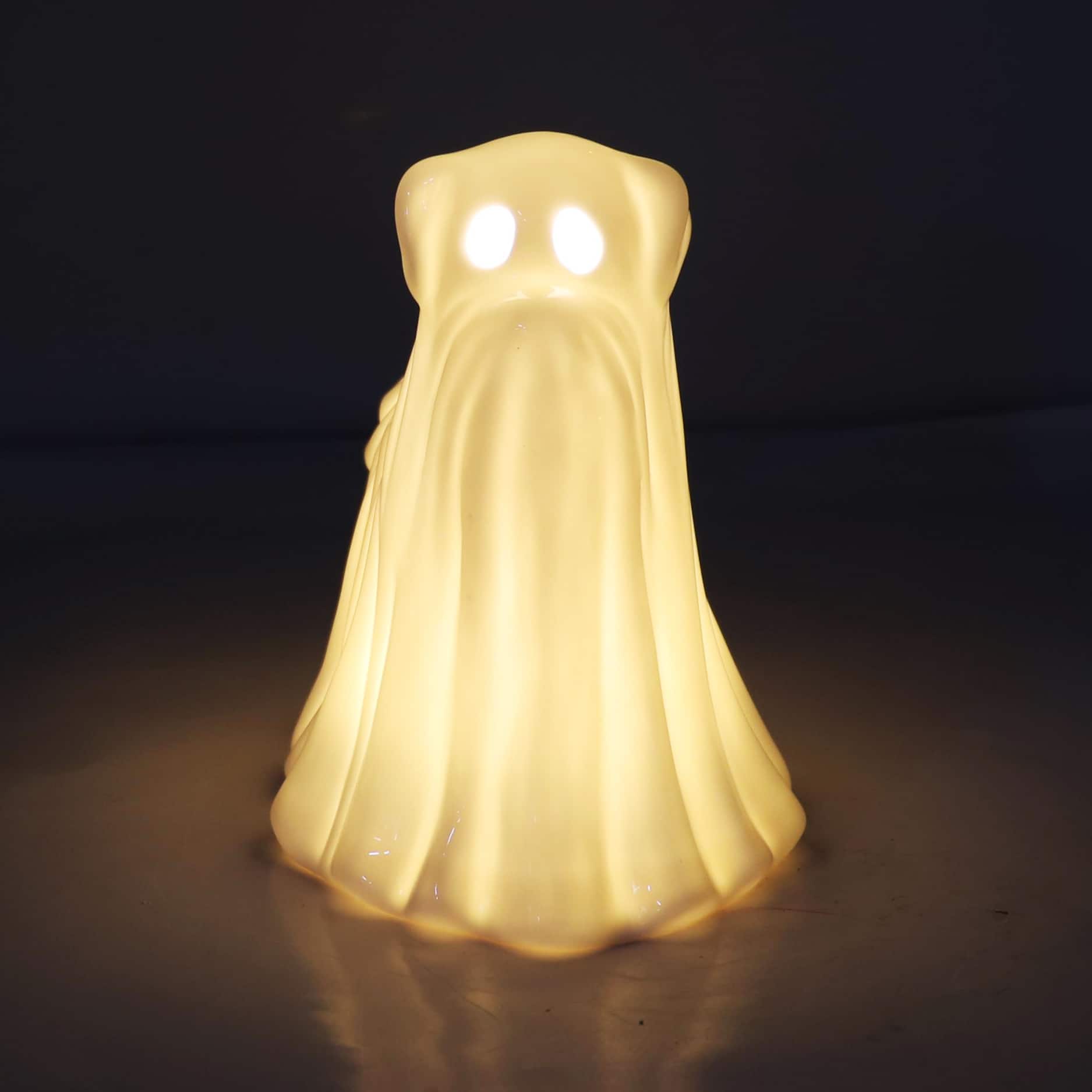 6.75&#x22; White Ghost Dog Pre-Lit Ceramic Tabletop D&#xE9;cor by Ashland&#xAE;