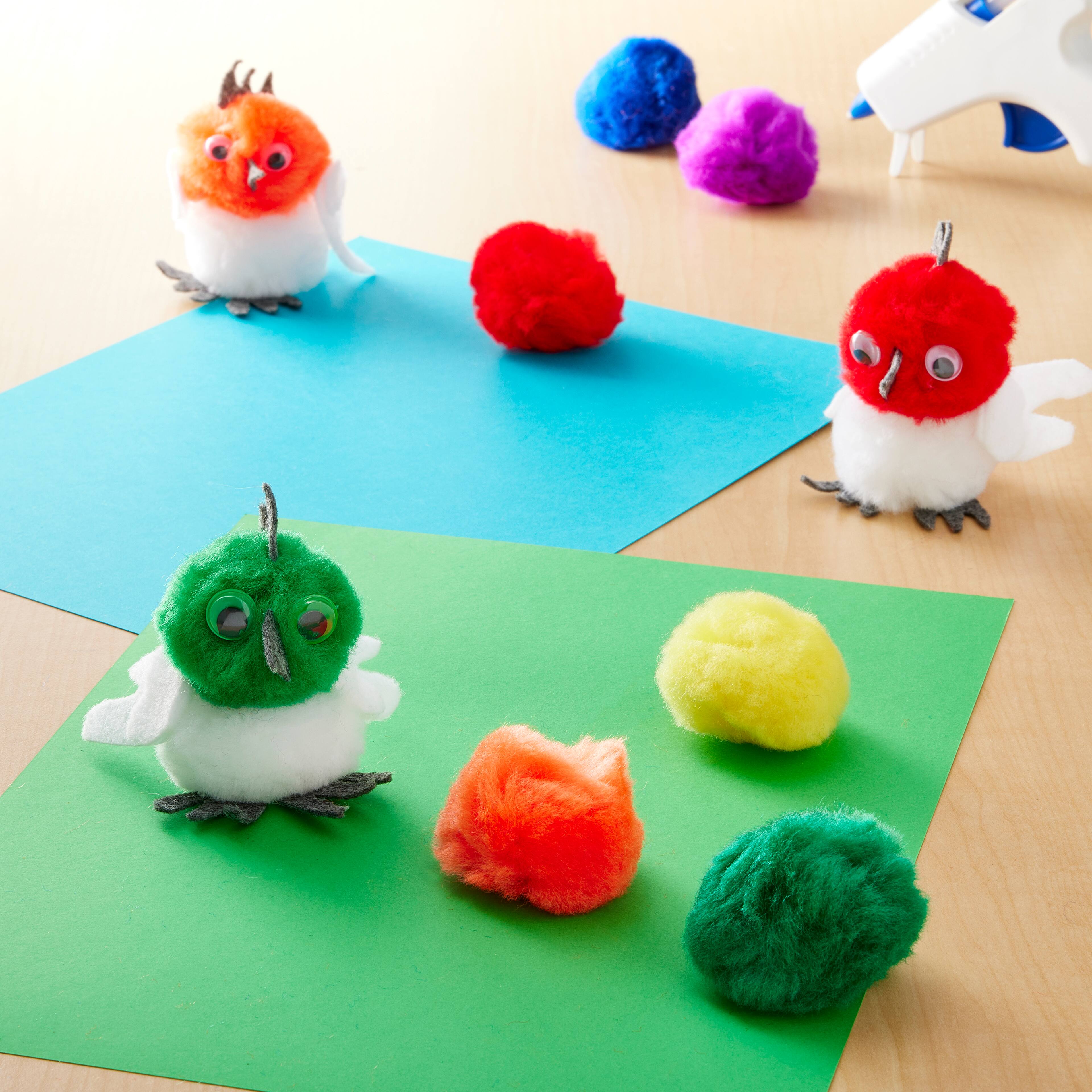 12 Packs: 20 ct. (240 total) 2" Rainbow Mix Pom Poms by Creatology™