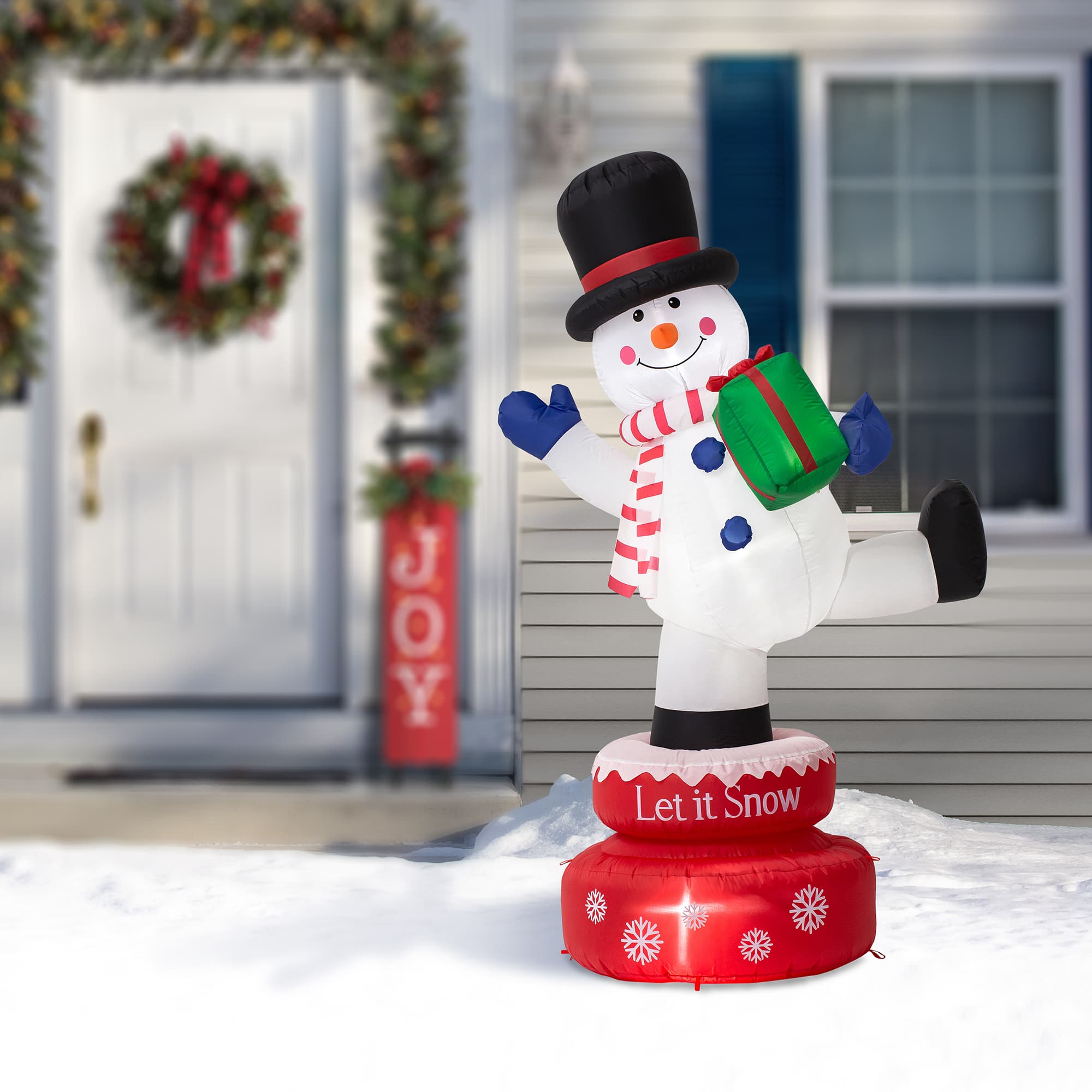 Glitzhome&#xAE; 6ft. Lighted Inflatable Rotating Snowman D&#xE9;cor