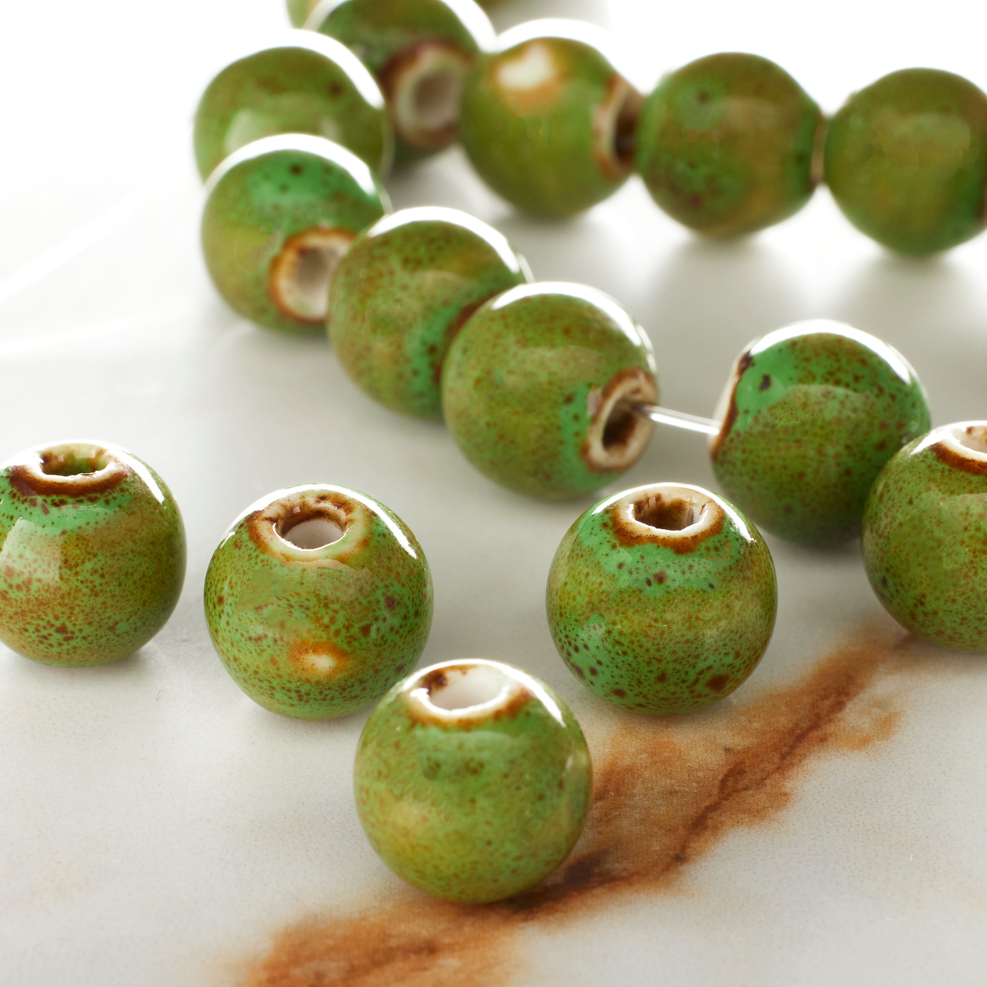 12 Pack: Green Ceramic Round Beads, 12mm by Bead Landing&#x2122;