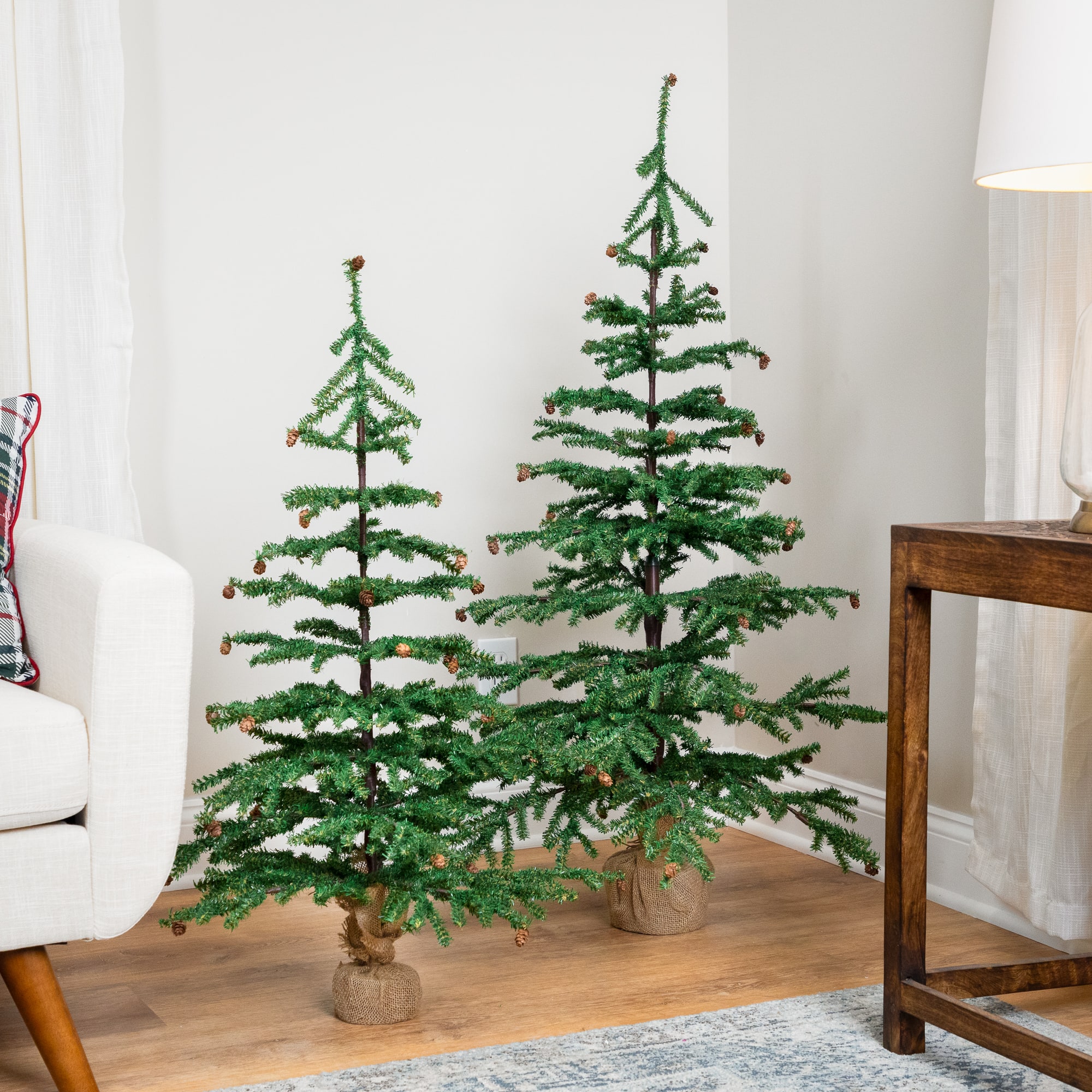 4ft. Unlit Medium Pine Artificial Christmas Tree with Pinecones in Burlap Base