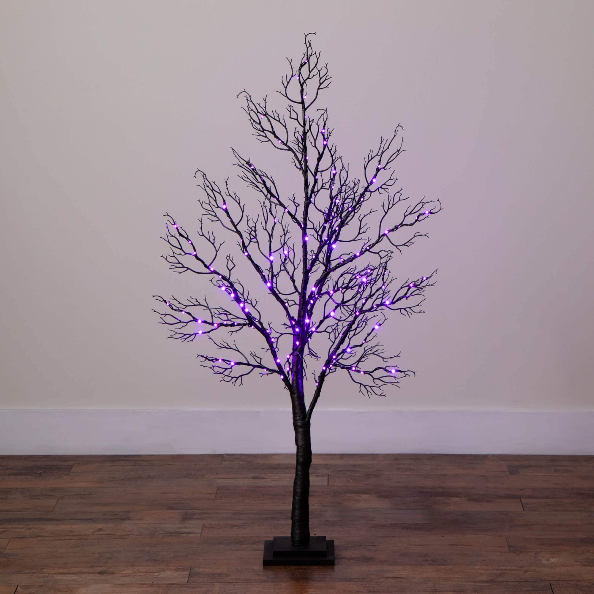 4ft. Pre-Lit Halloween Minimalist Twig Artificial Fall Tree with 160 Orange &#x26; Purple LED Lights