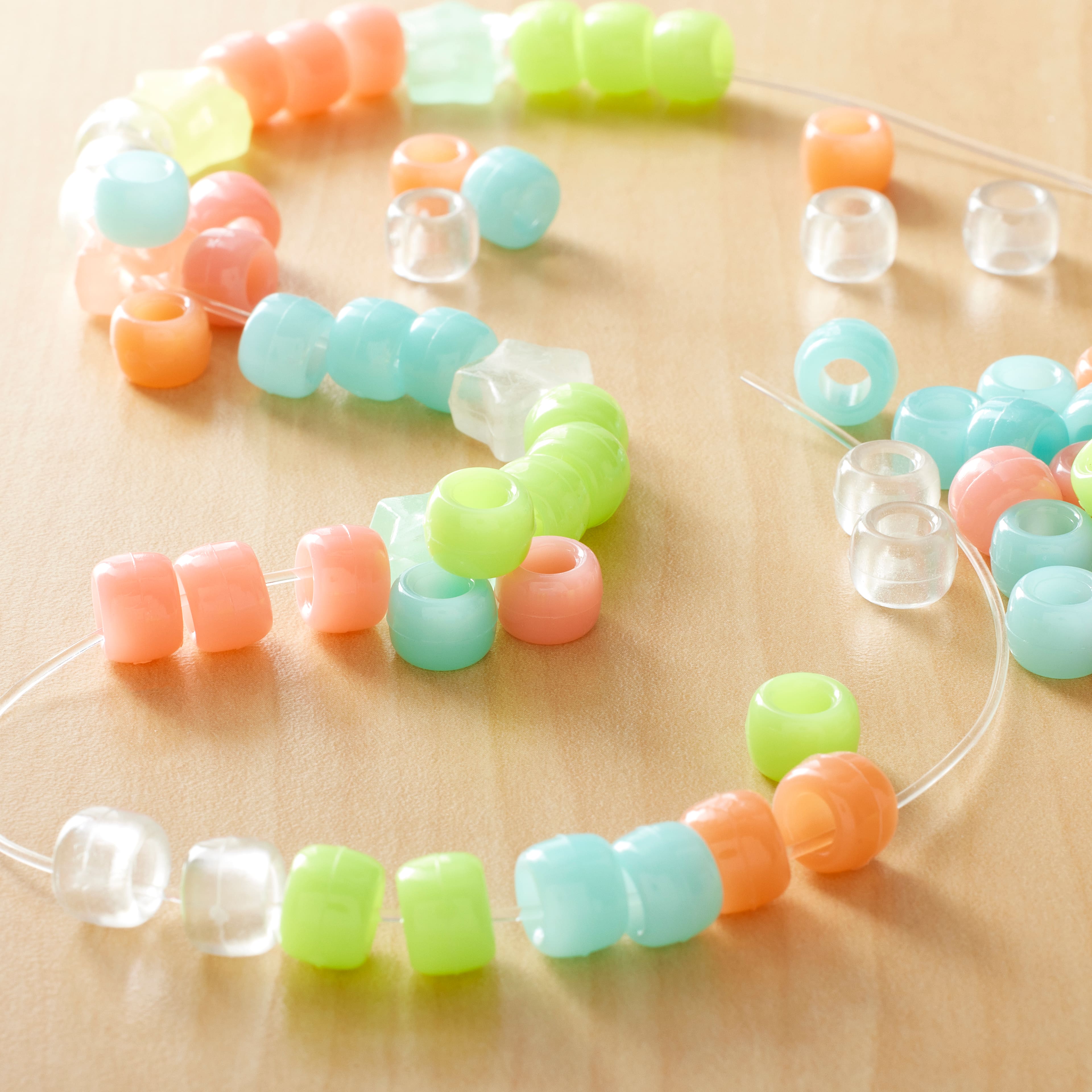 12 Packs: 280 ct. (3,360 total) Glow in the Dark Pony Beads by Creatology&#x2122;, 6mm x 9mm