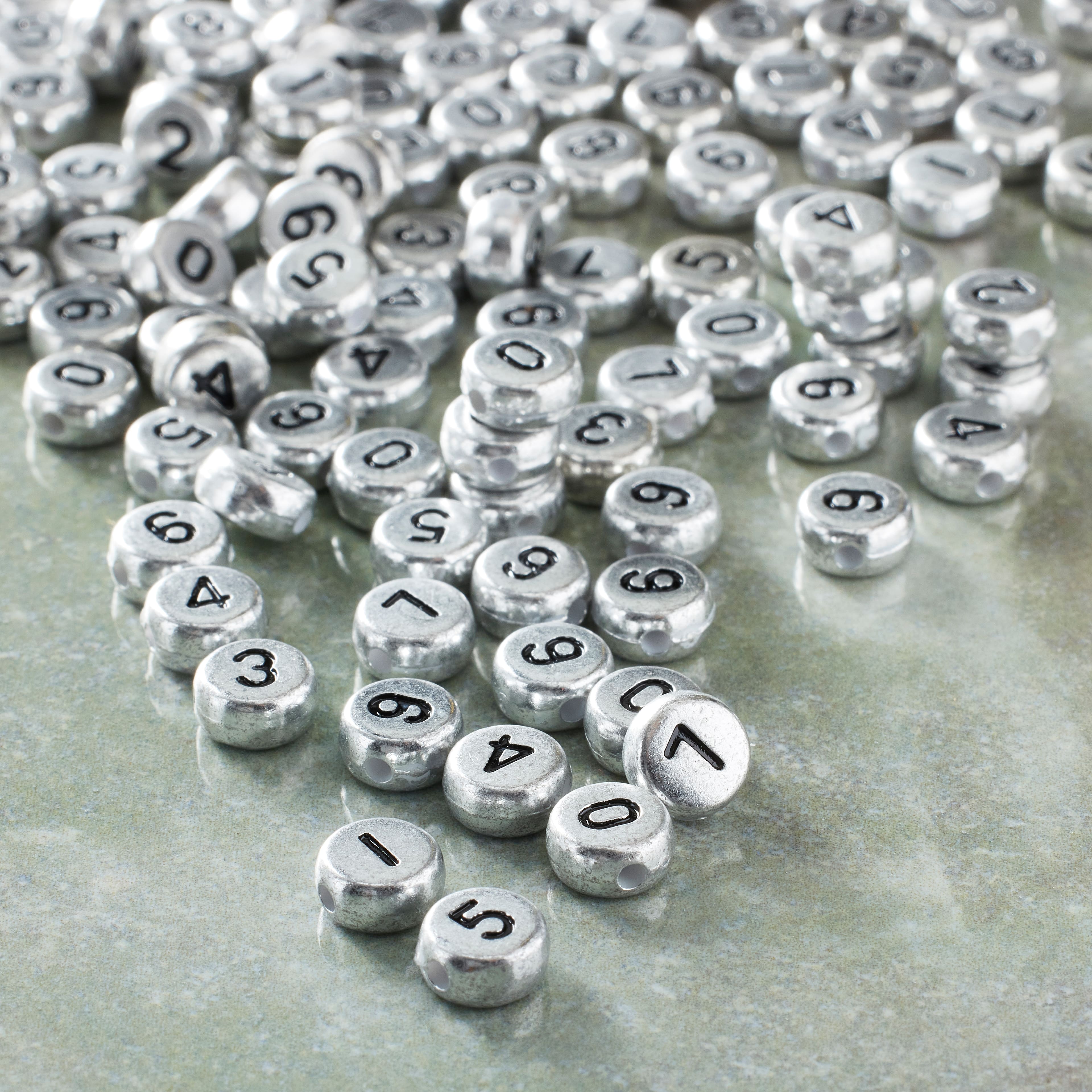 12 Packs: 390 ct. (4,680 total) Plastic Number Circle Craft Beads by Bead Landing™, 7mm
