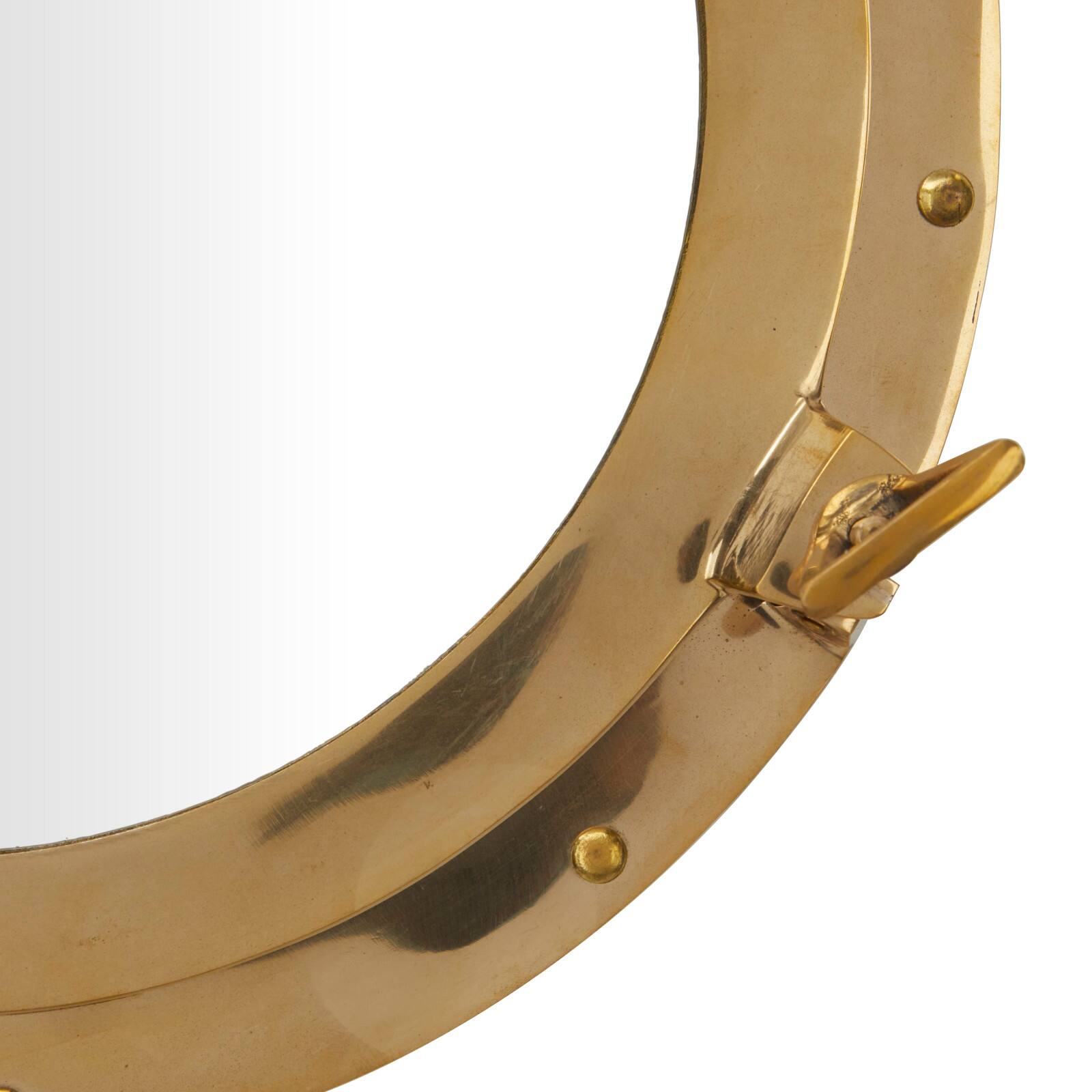 The Novogratz Gold Brass Sail Boat Wall Mirror with Port Hole Detailing 15&#x22; x 3&#x22; x 15&#x22;