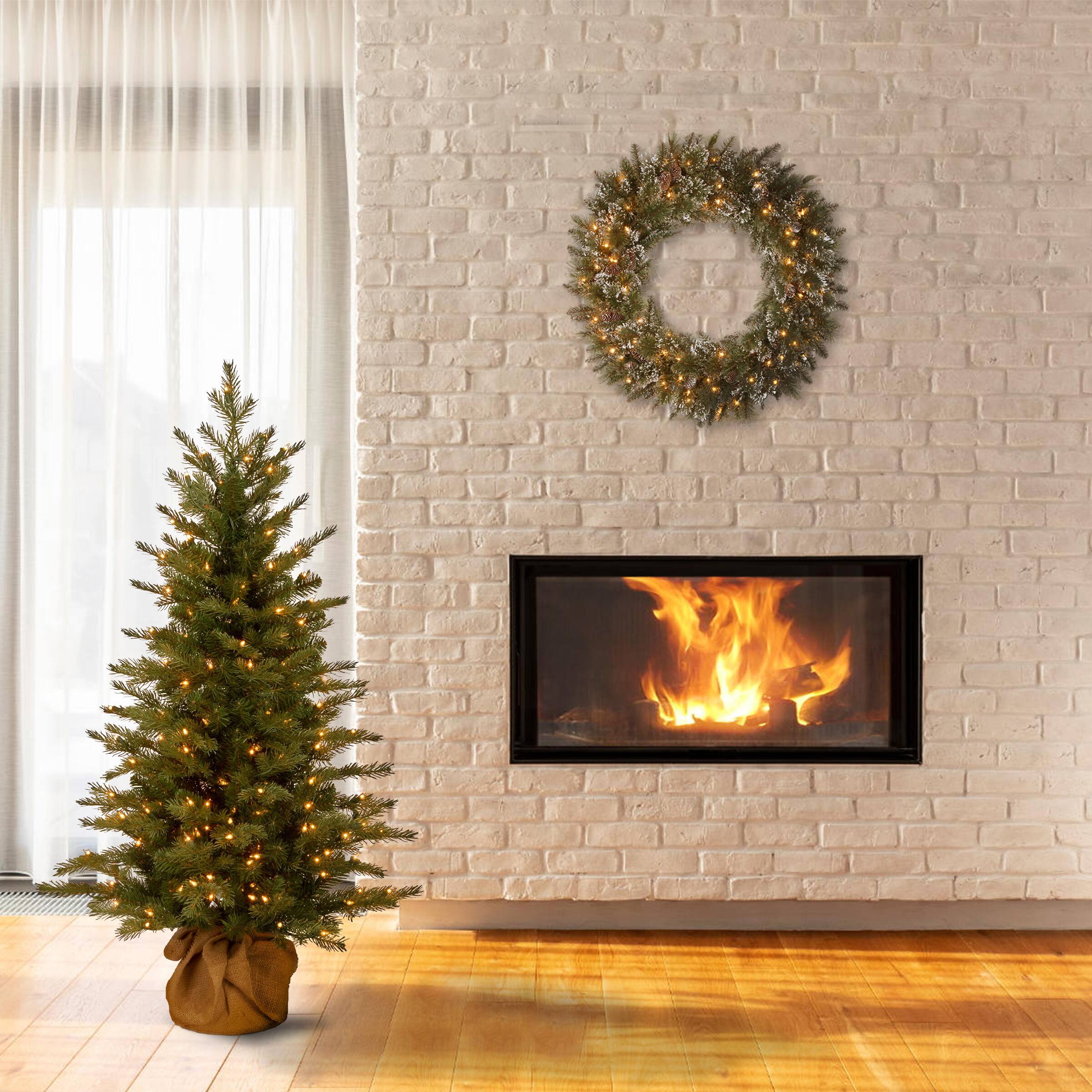 4ft. Pre-Lit Feel Real&#xAE; Nordic Spruce Small Artificial Christmas Tree In Burlap, Clear Lights