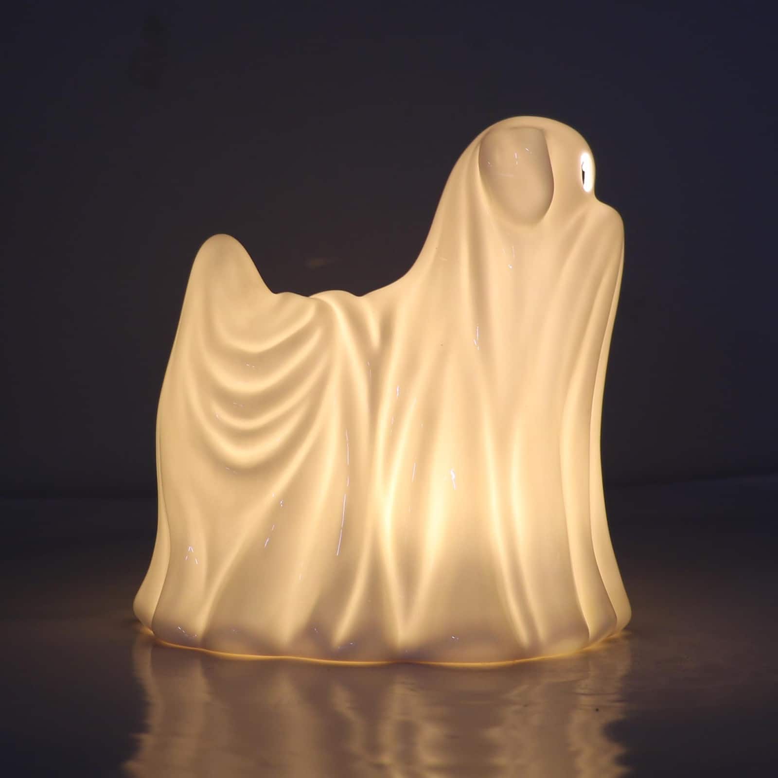 6.75&#x22; White Ghost Dog Pre-Lit Ceramic Tabletop D&#xE9;cor by Ashland&#xAE;