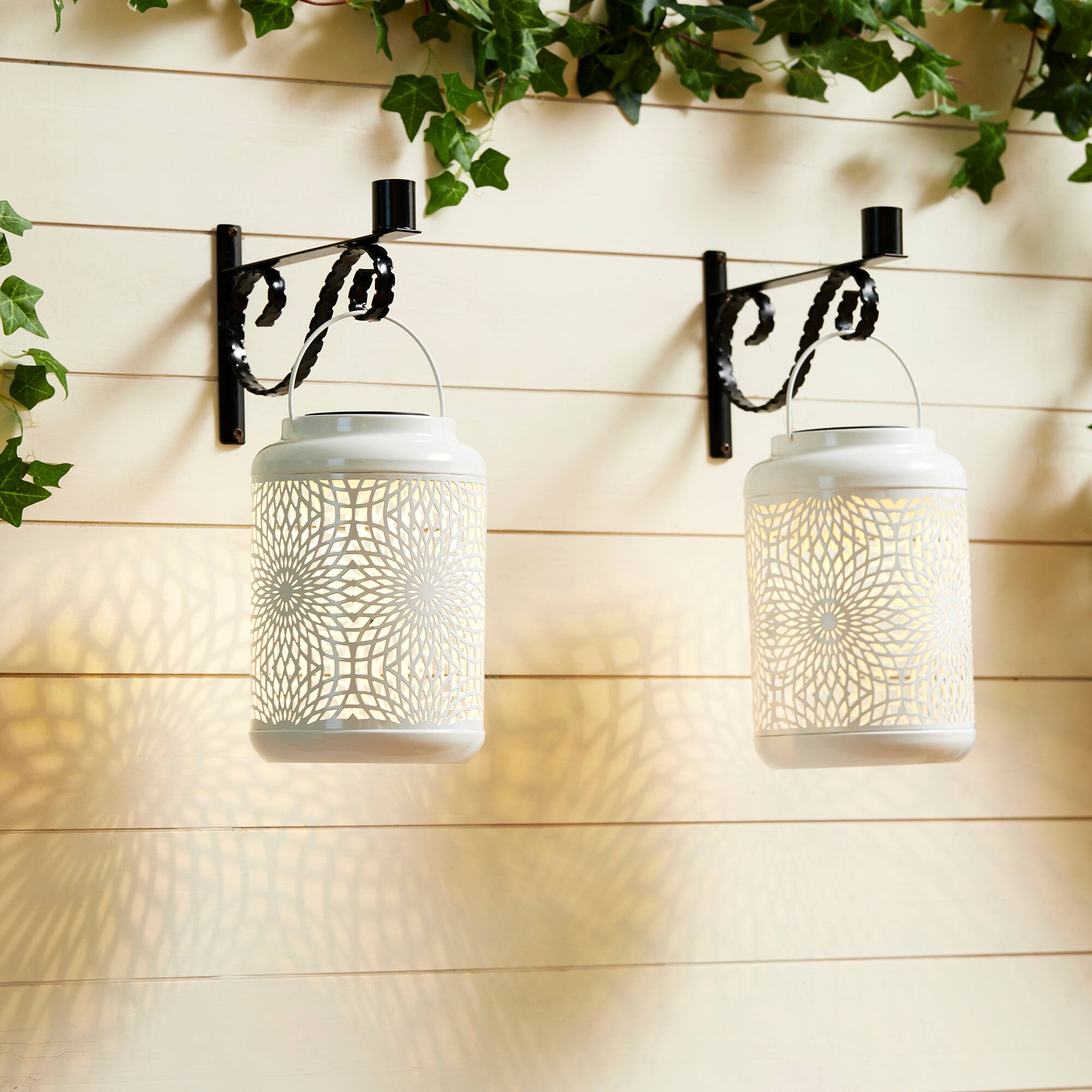 Glitzhome&#xAE; 8.75&#x22; Metal Cutout Solar Powered Hanging Lantern Set